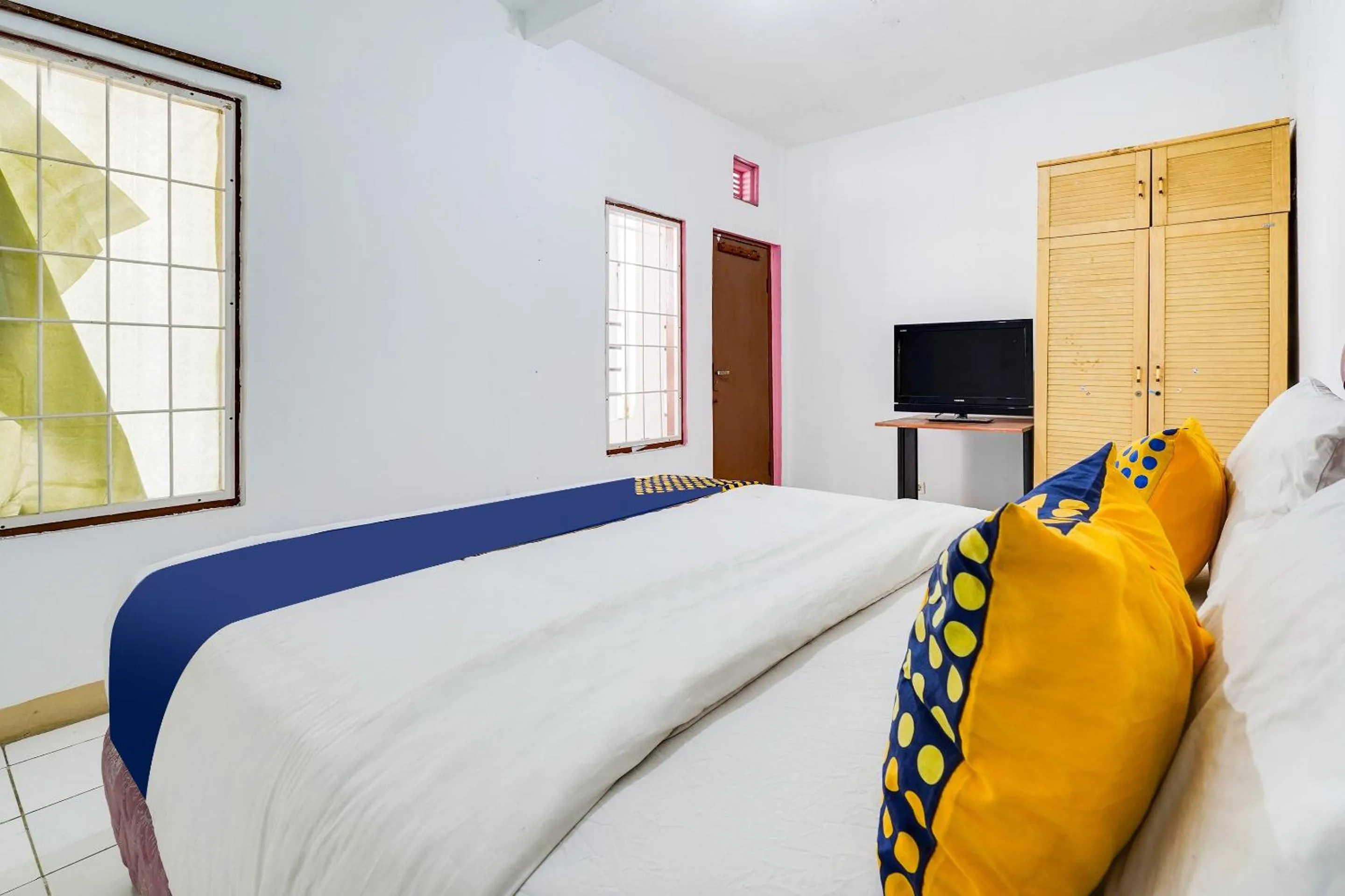 Bedroom in OYO 91546 Dewi Sudirman Homestay