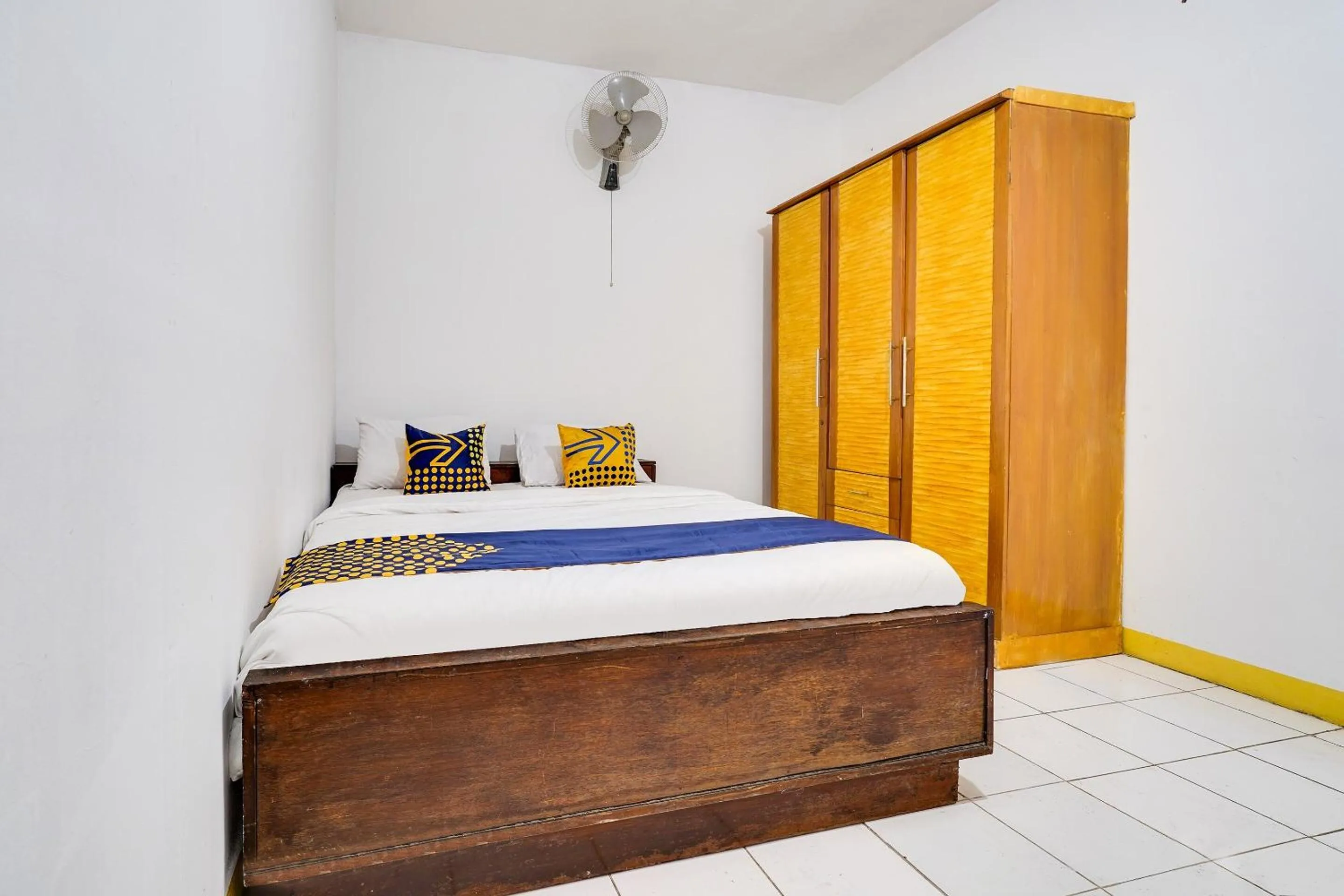 Bedroom in OYO 91546 Dewi Sudirman Homestay