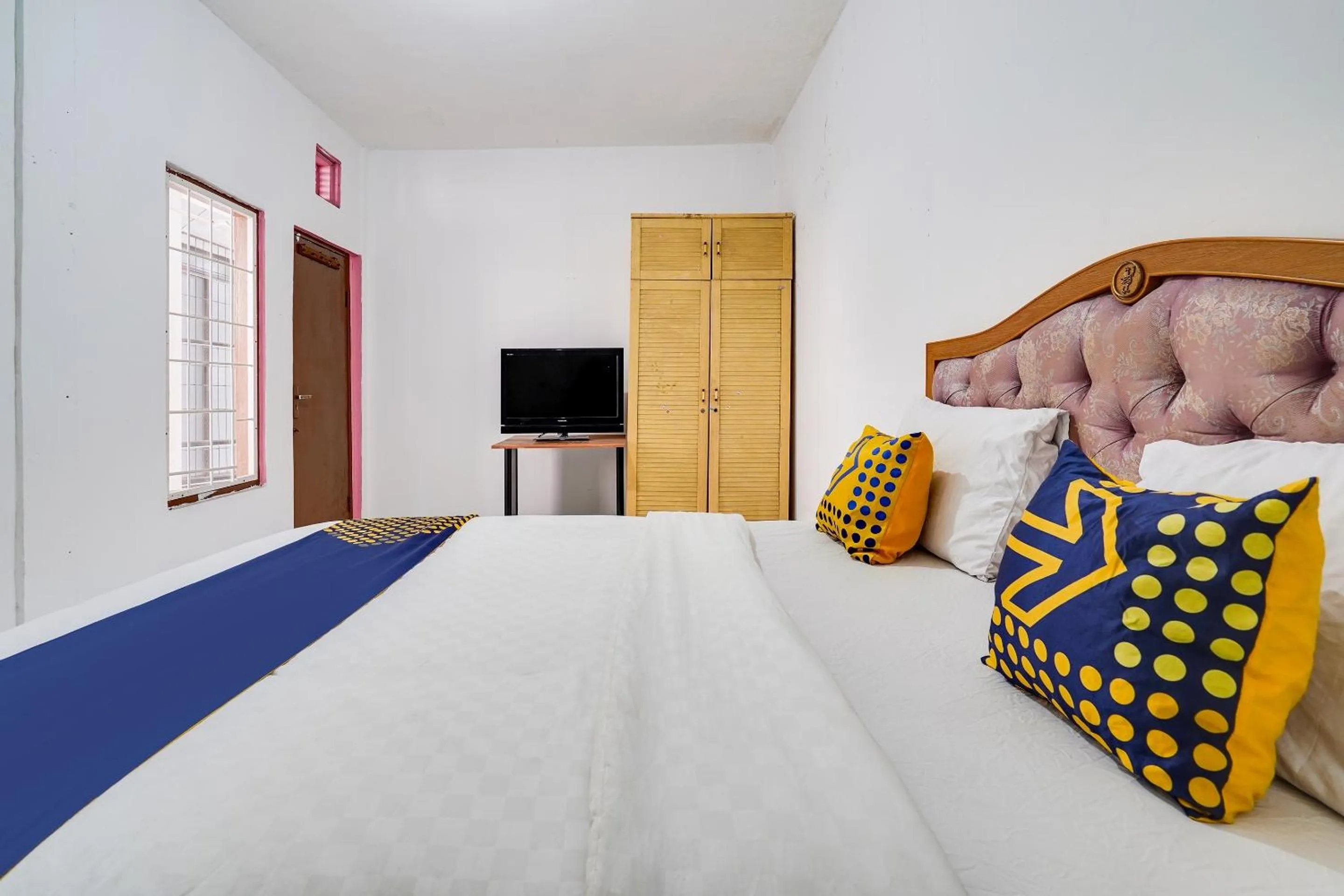 Bedroom in OYO 91546 Dewi Sudirman Homestay