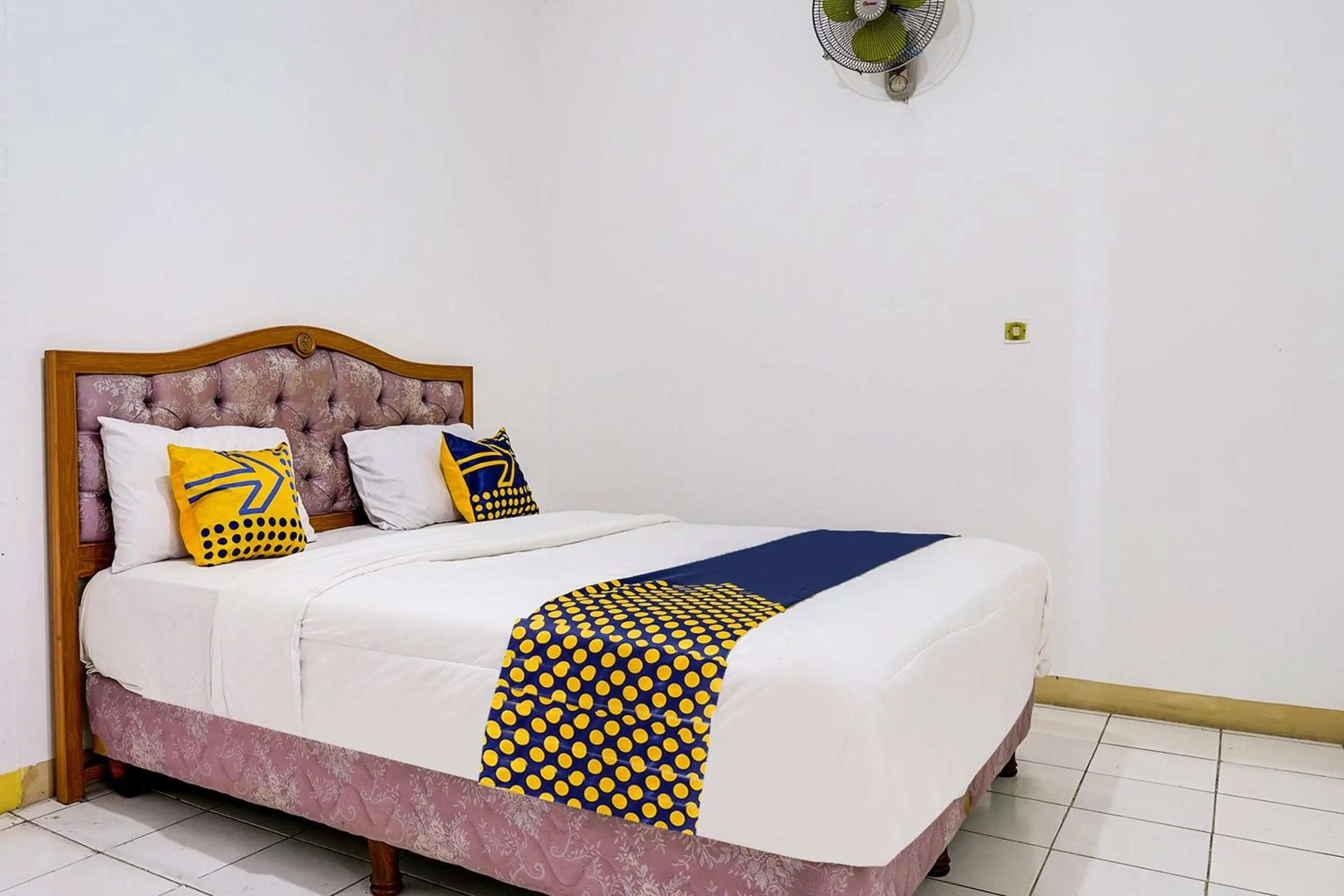 Bedroom in OYO 91546 Dewi Sudirman Homestay