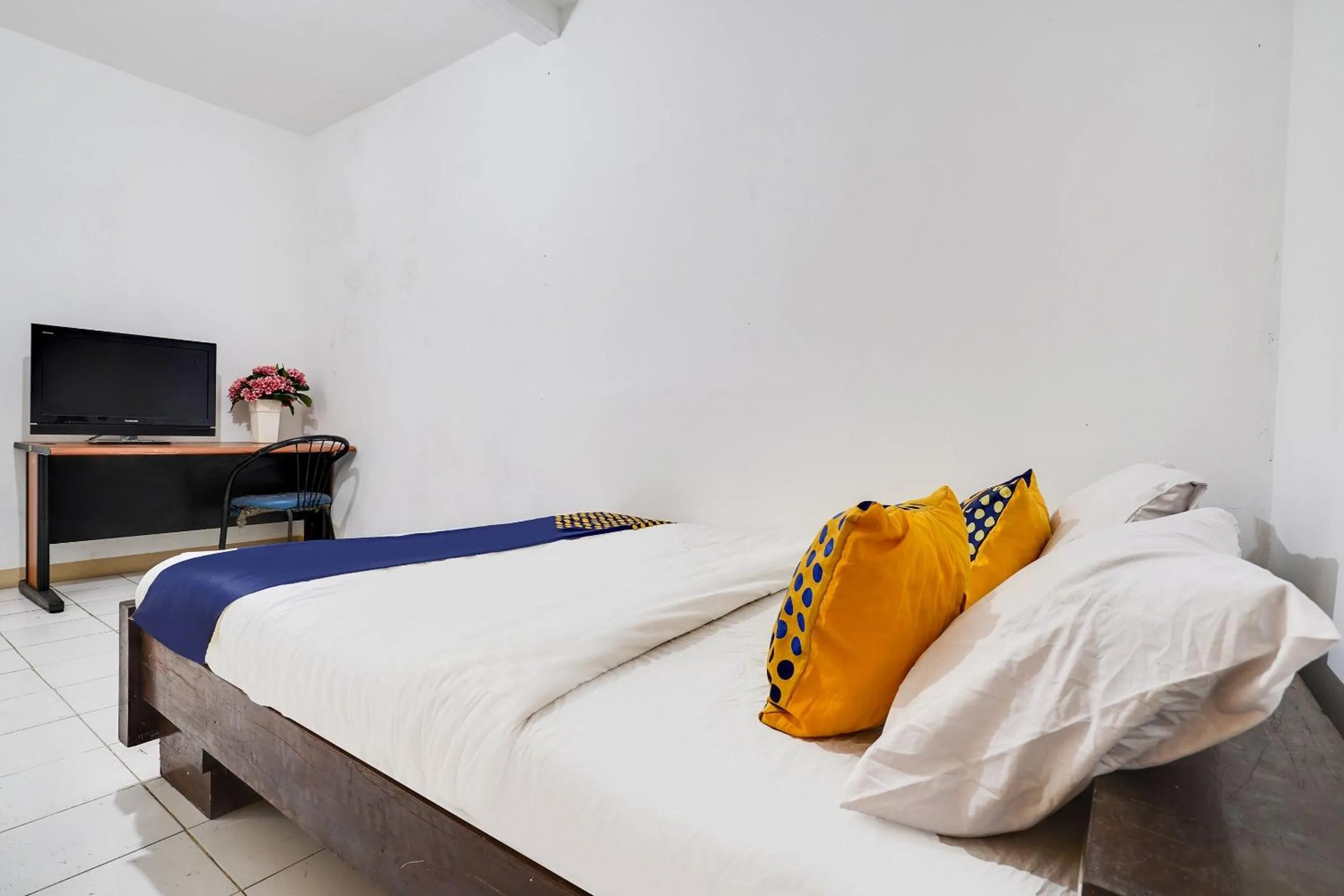 Bedroom in OYO 91546 Dewi Sudirman Homestay