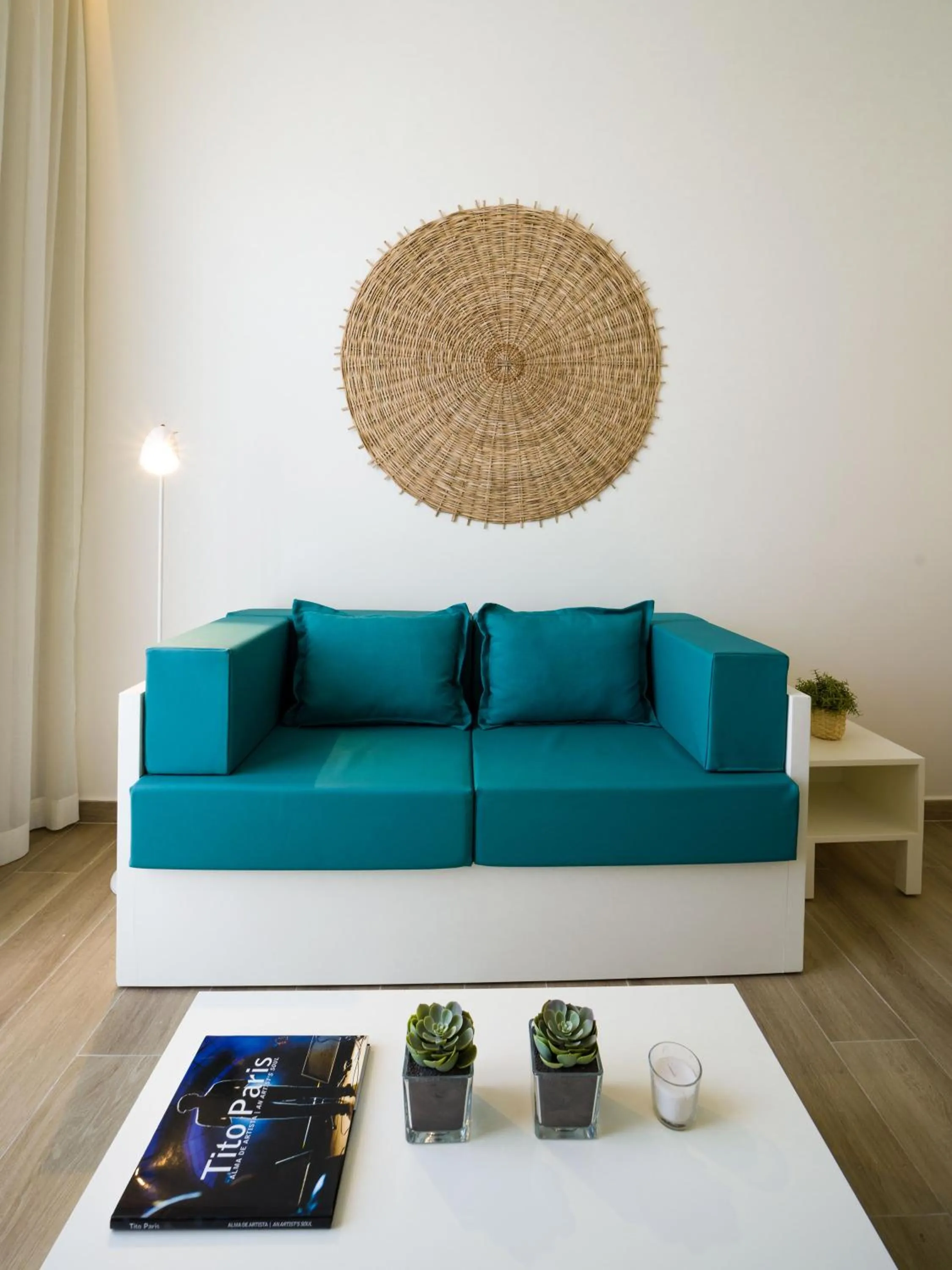 Communal lounge/ TV room in Oasis Tarrafal Alfandega Suites