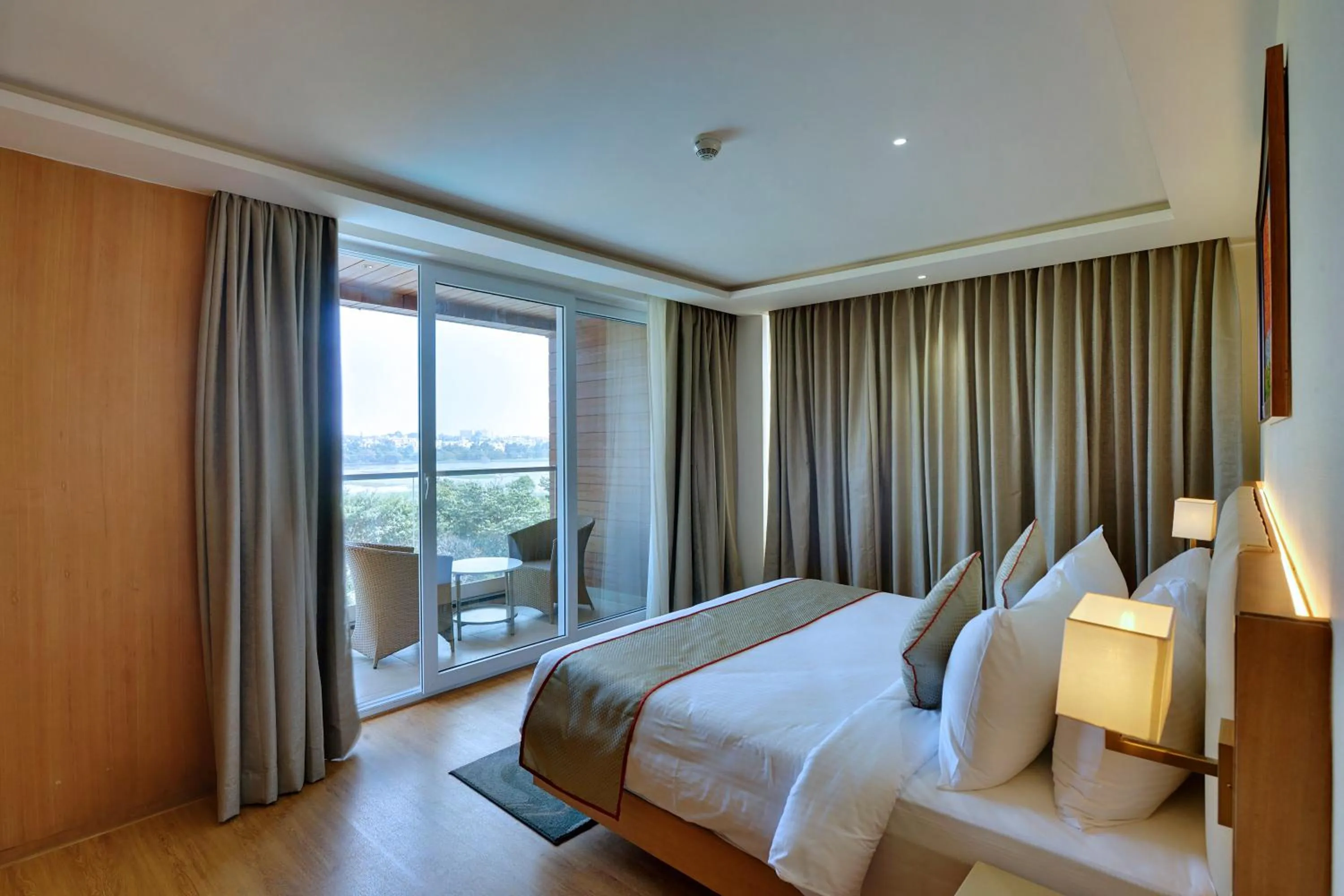 Bed in Clarion Hotel Bangalore