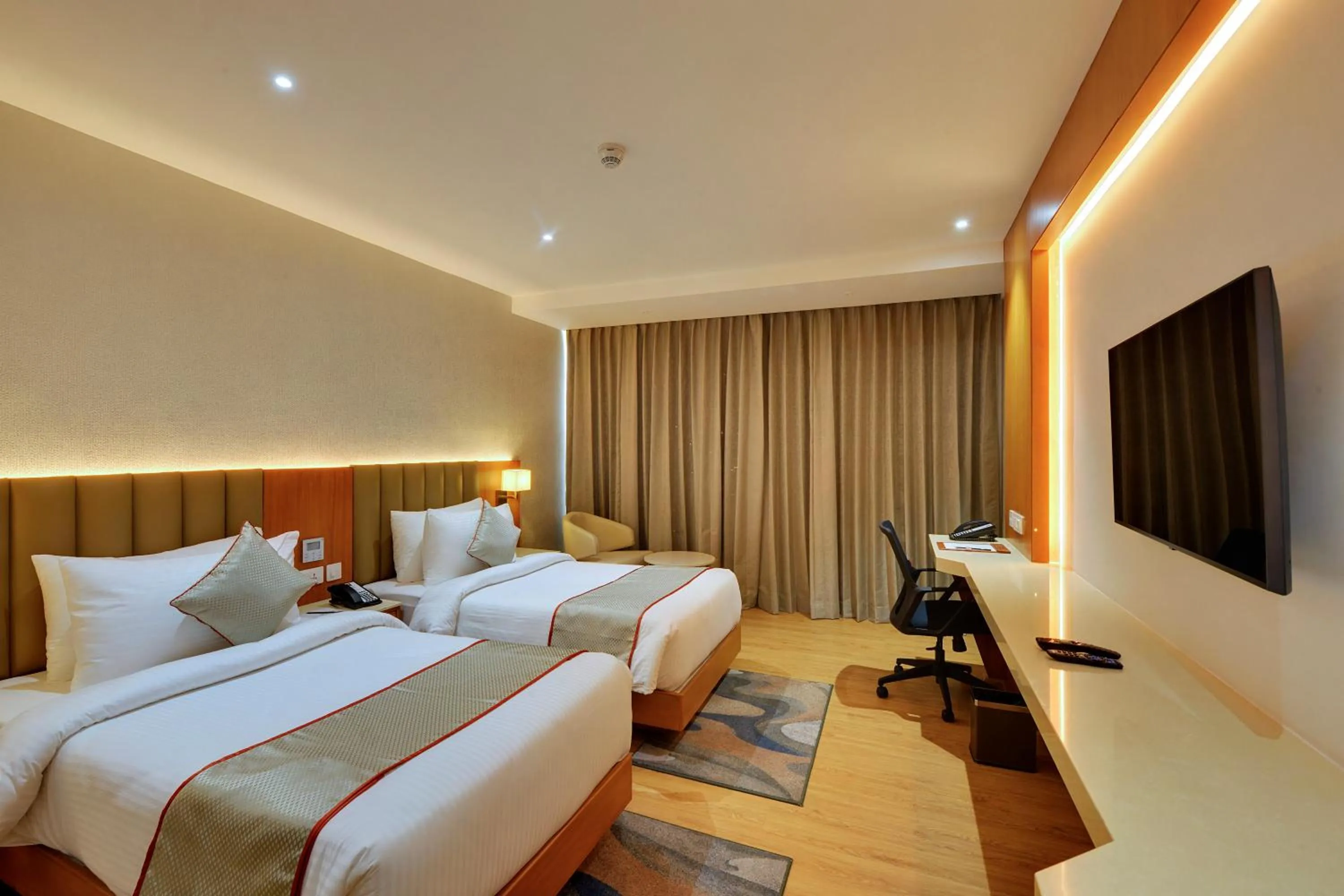 Bed in Clarion Hotel Bangalore
