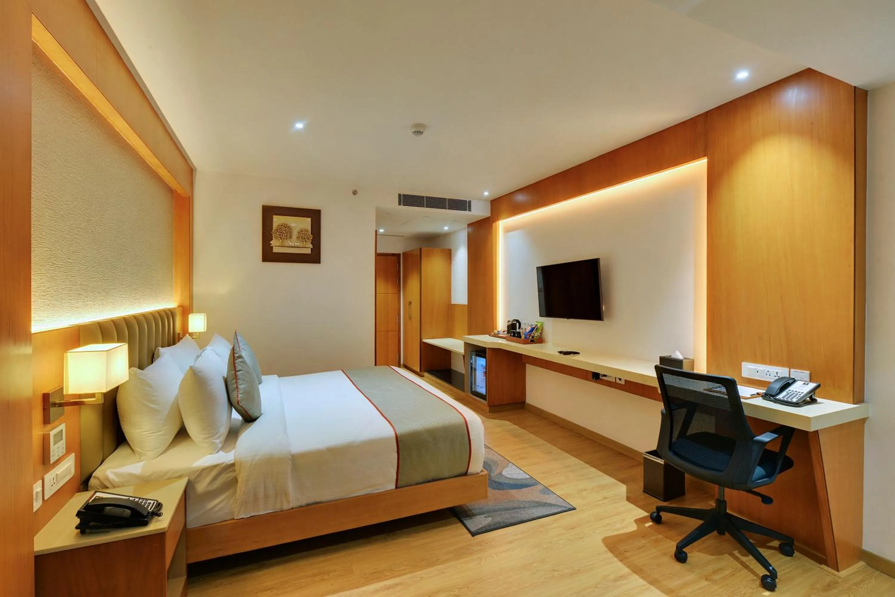 Bed in Clarion Hotel Bangalore