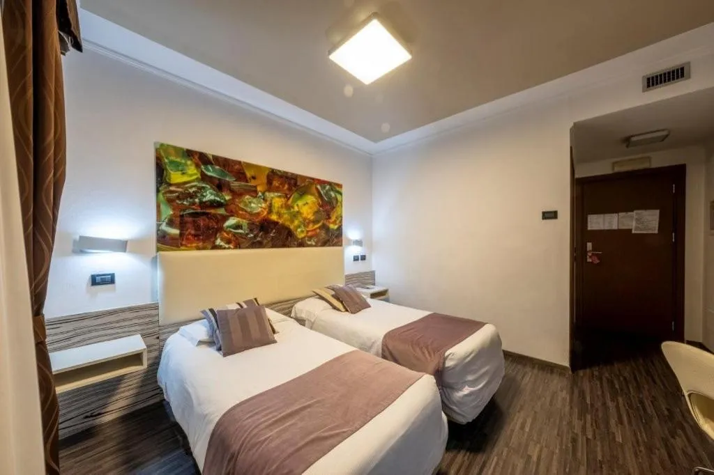 Bed in Hotel Le Palme Lago Maggiore