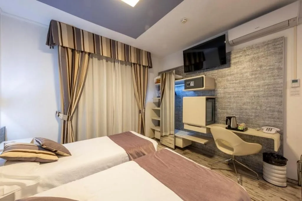 Bed in Hotel Le Palme Lago Maggiore