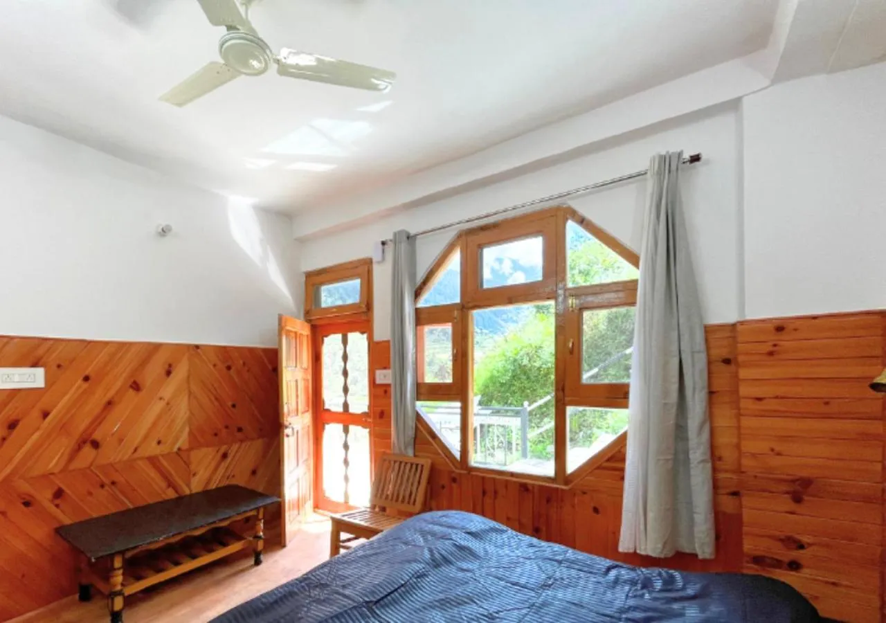 Bed in Young Monk Homestay Jibhi