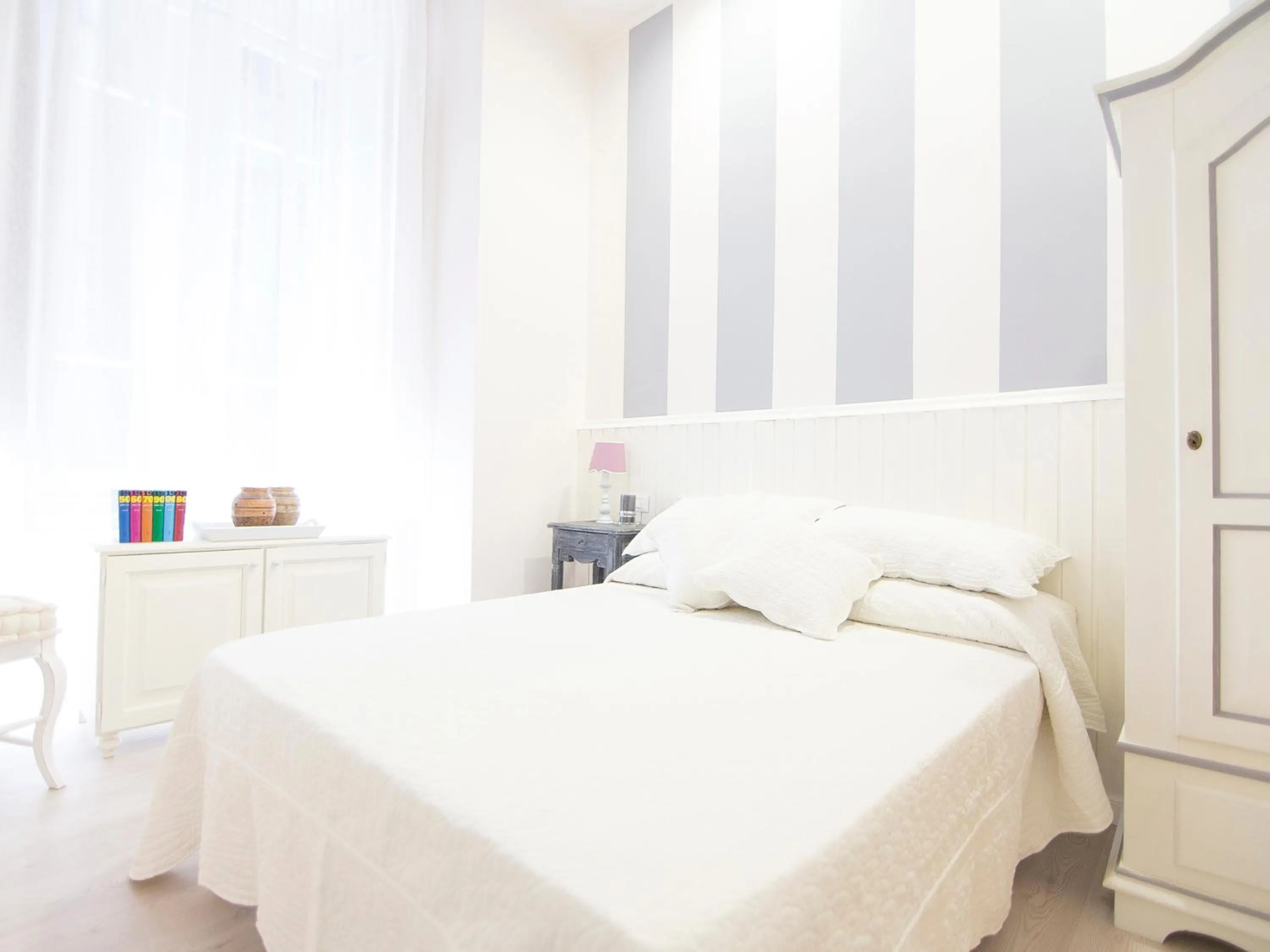 Photo of the whole room in Lungomare Rooms & Charme