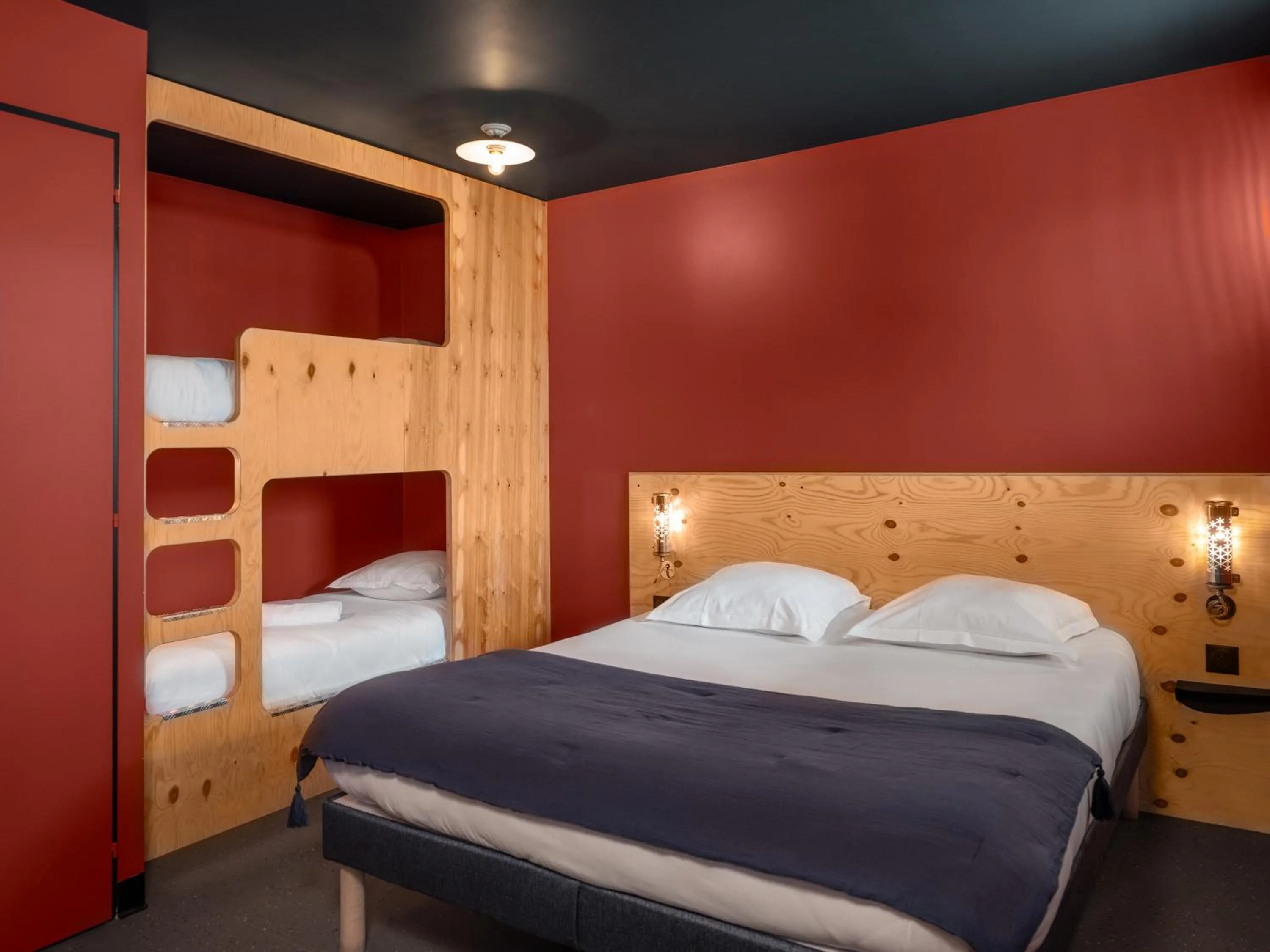 Bed in Eklo Hotels Paris Roissy CDG Airport