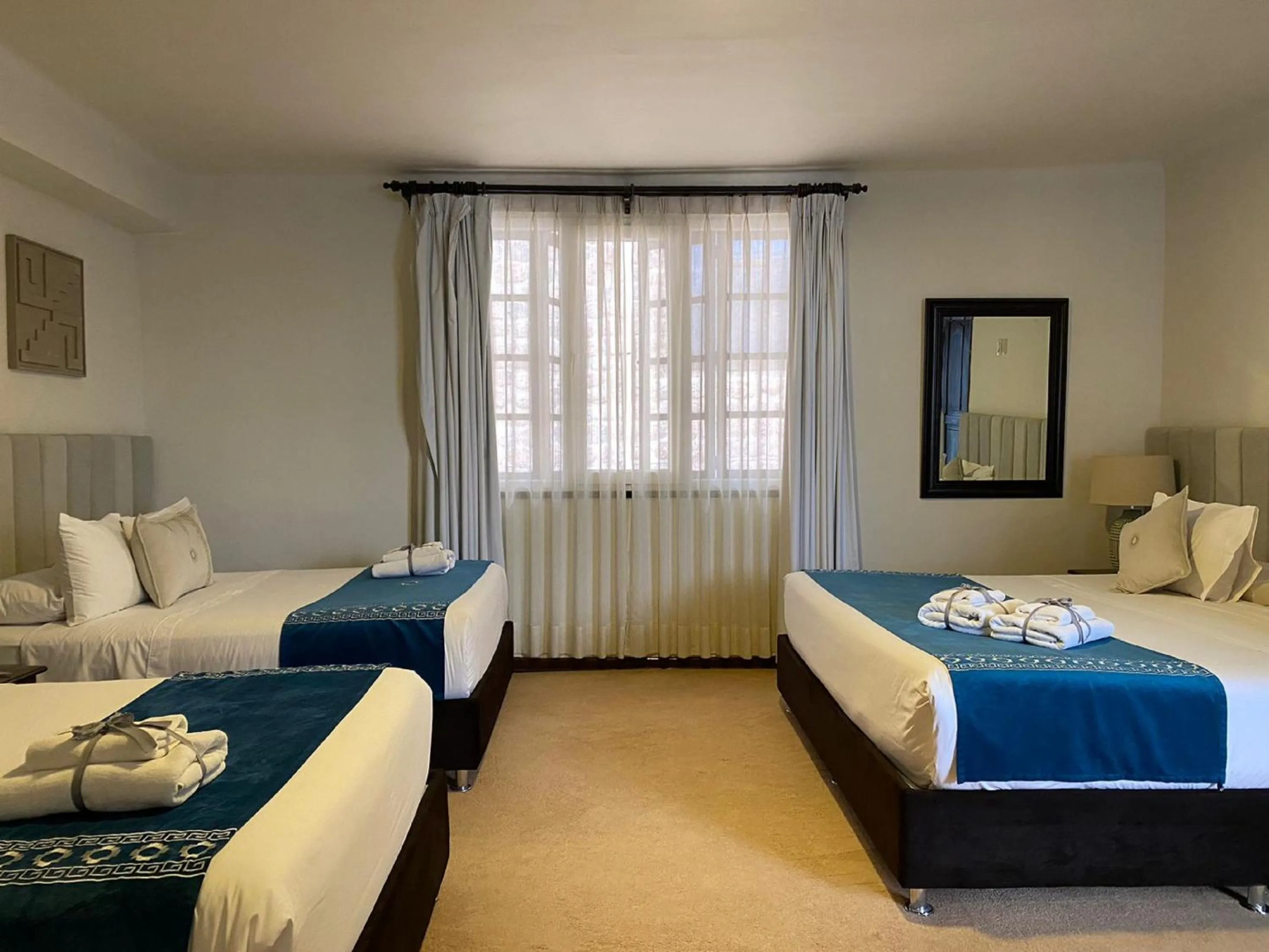 Photo of the whole room, Bed in Katari at Plaza de Armas Cusco