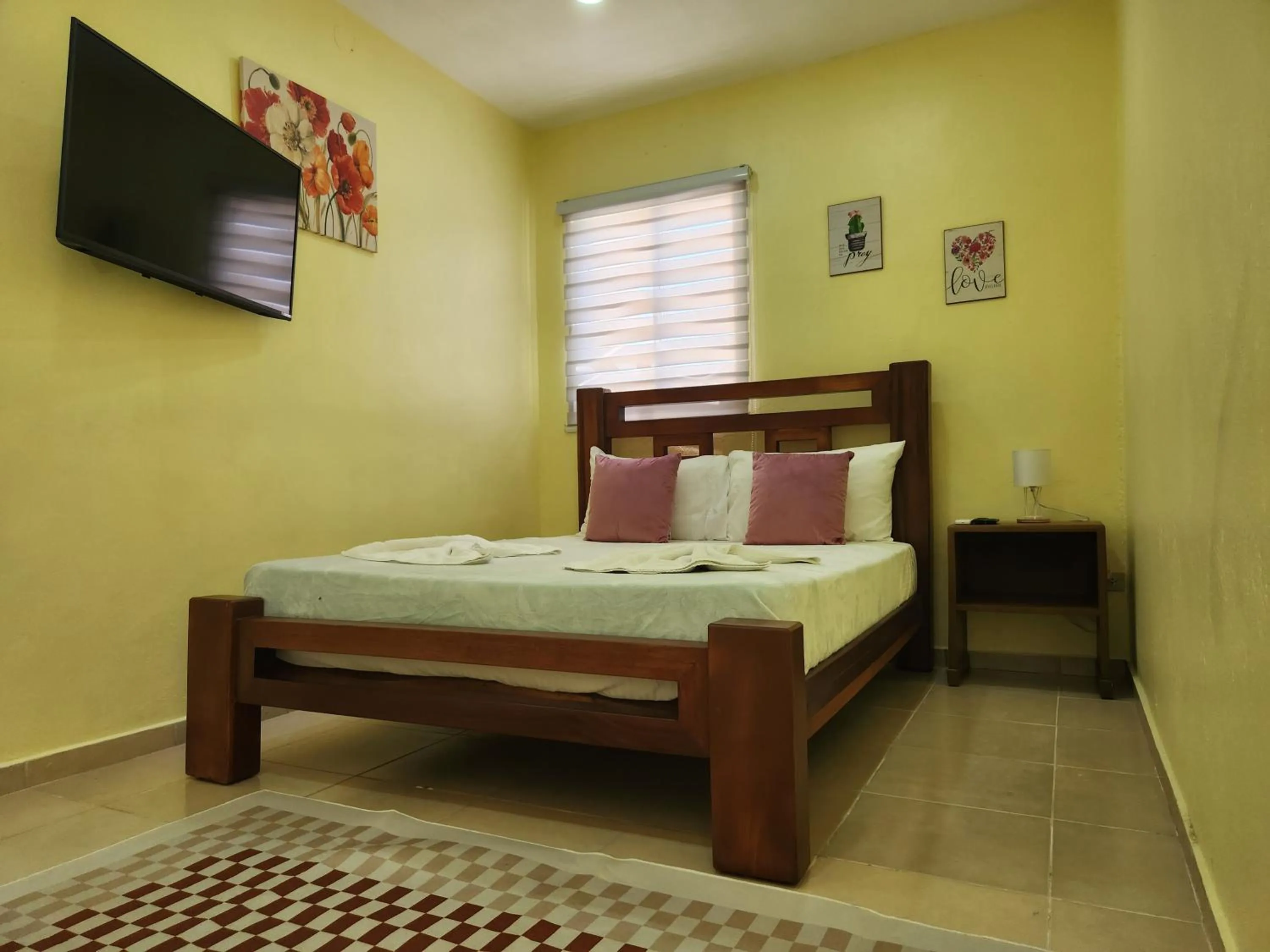 Bed in Apartamentos Melya cerca de la Playa Caleta