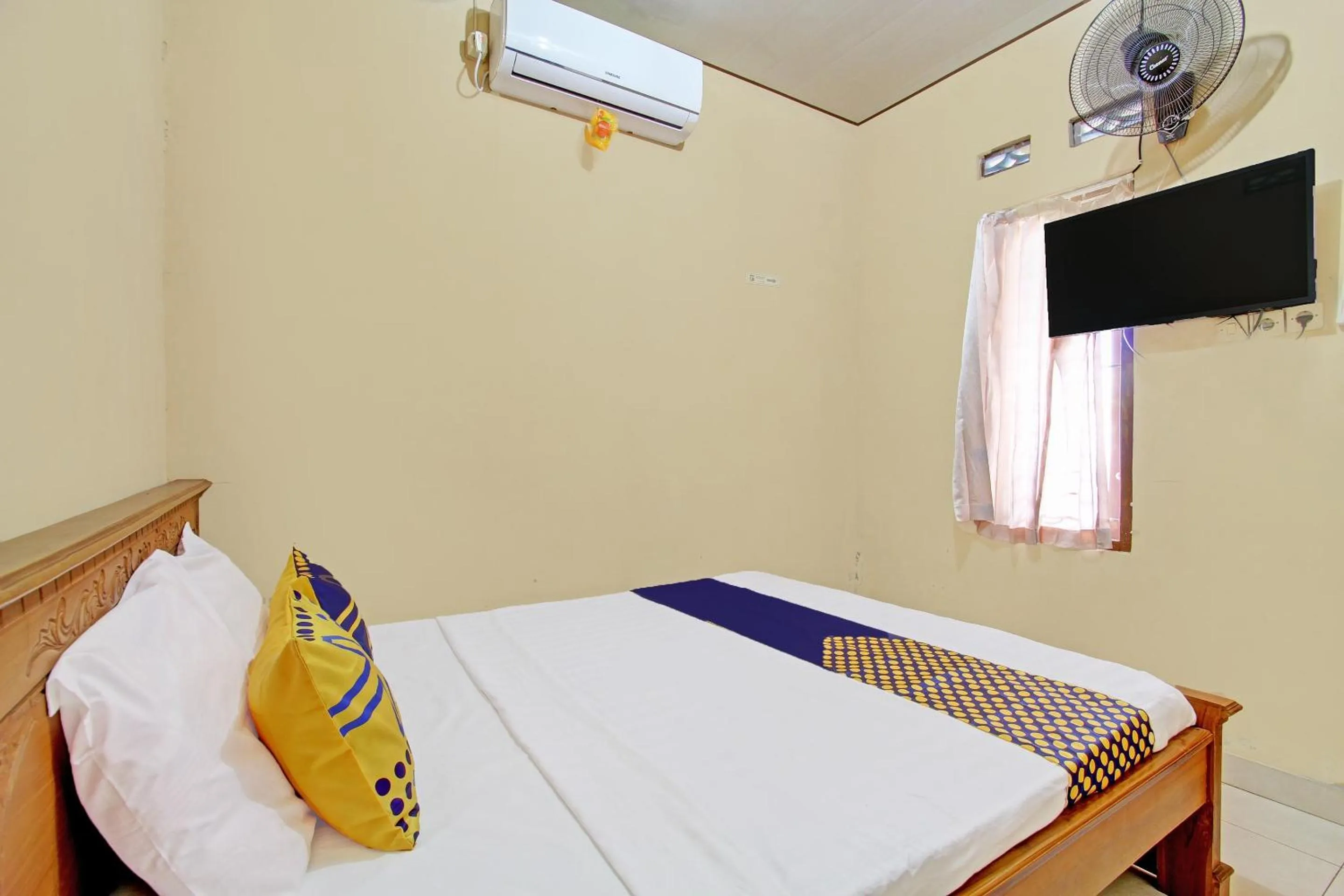 Bedroom, Bed in Hotel O Timoti Guest House