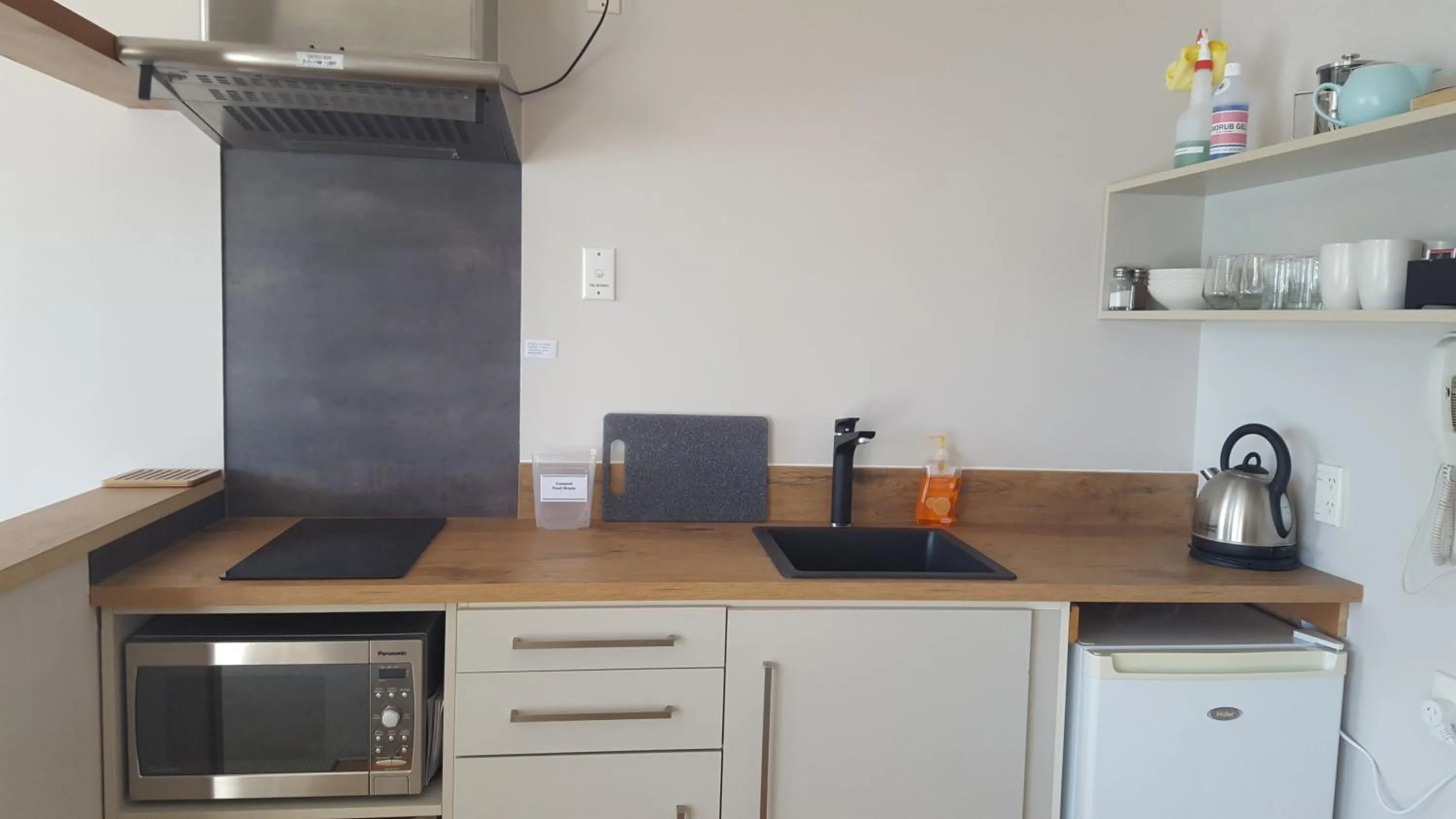 Kitchen or kitchenette in Akaroa Waterfront Motels