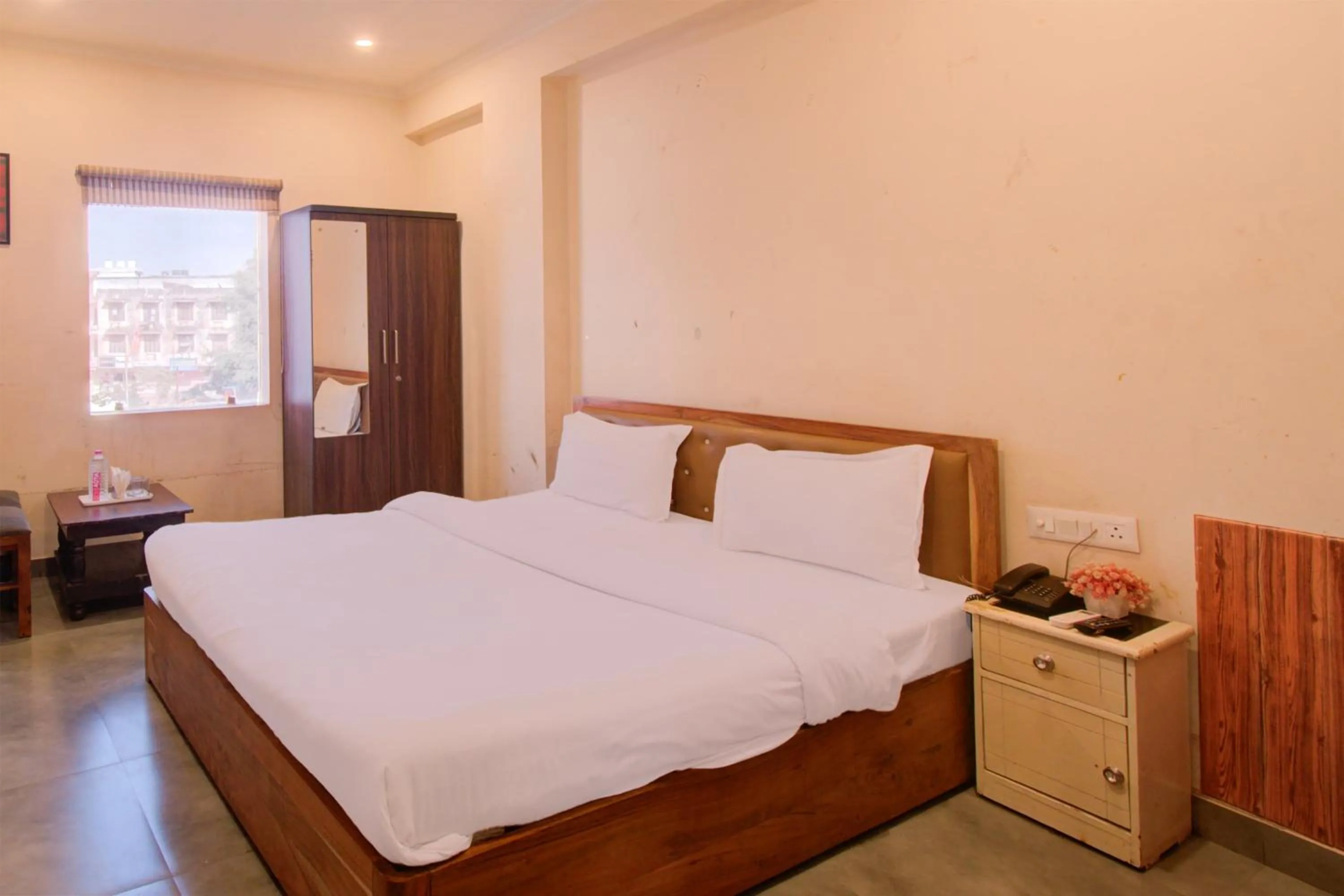 Bed in Hotel Bhagwati Palace