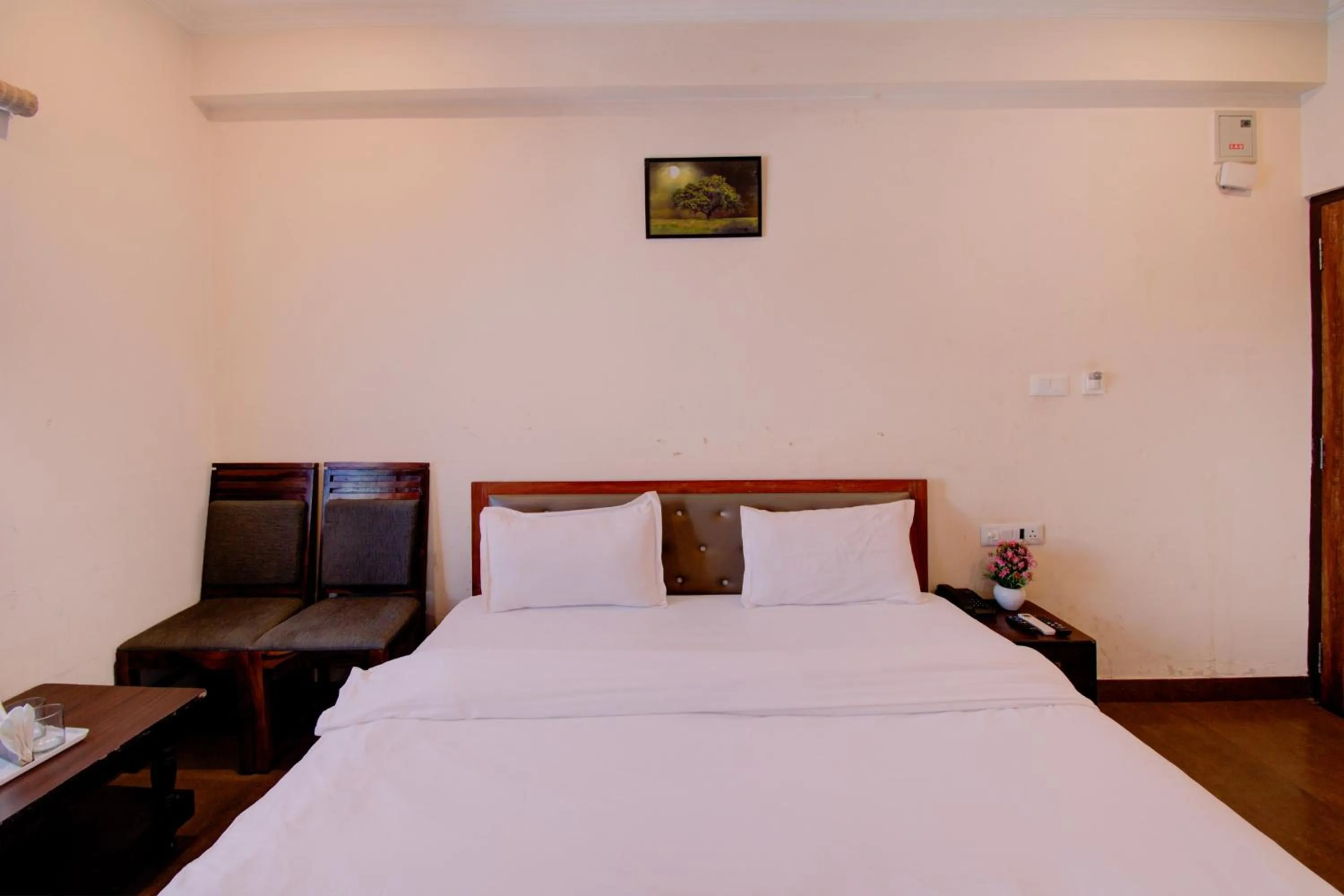 Bed in Hotel Bhagwati Palace