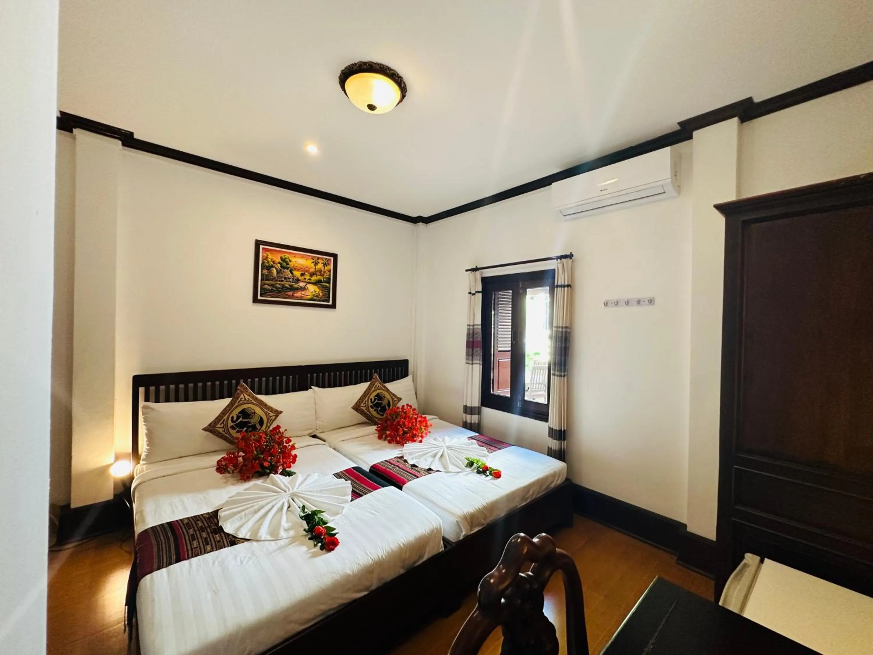 Bed in Thatsaphone Hotel