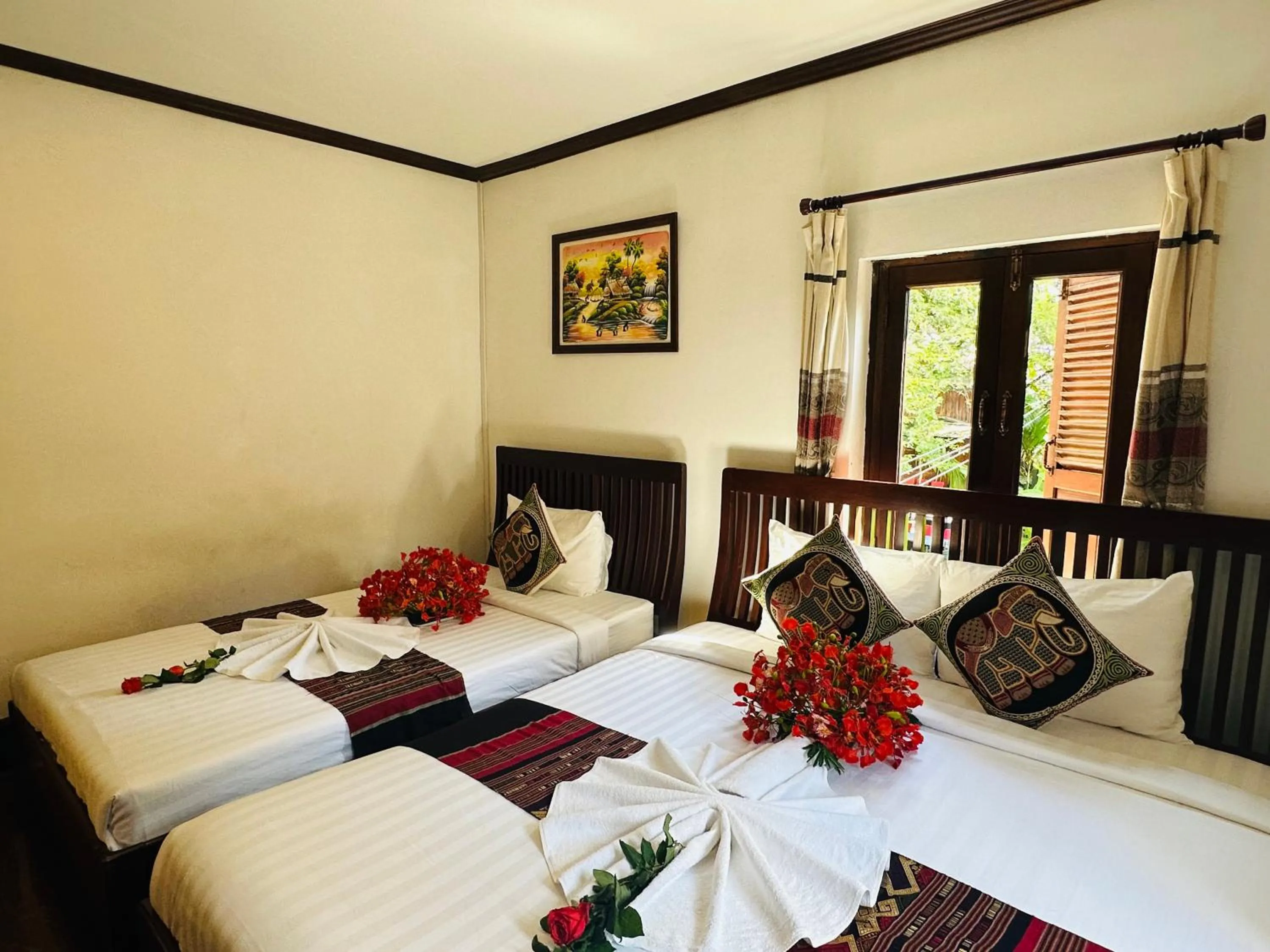 Bed in Thatsaphone Hotel