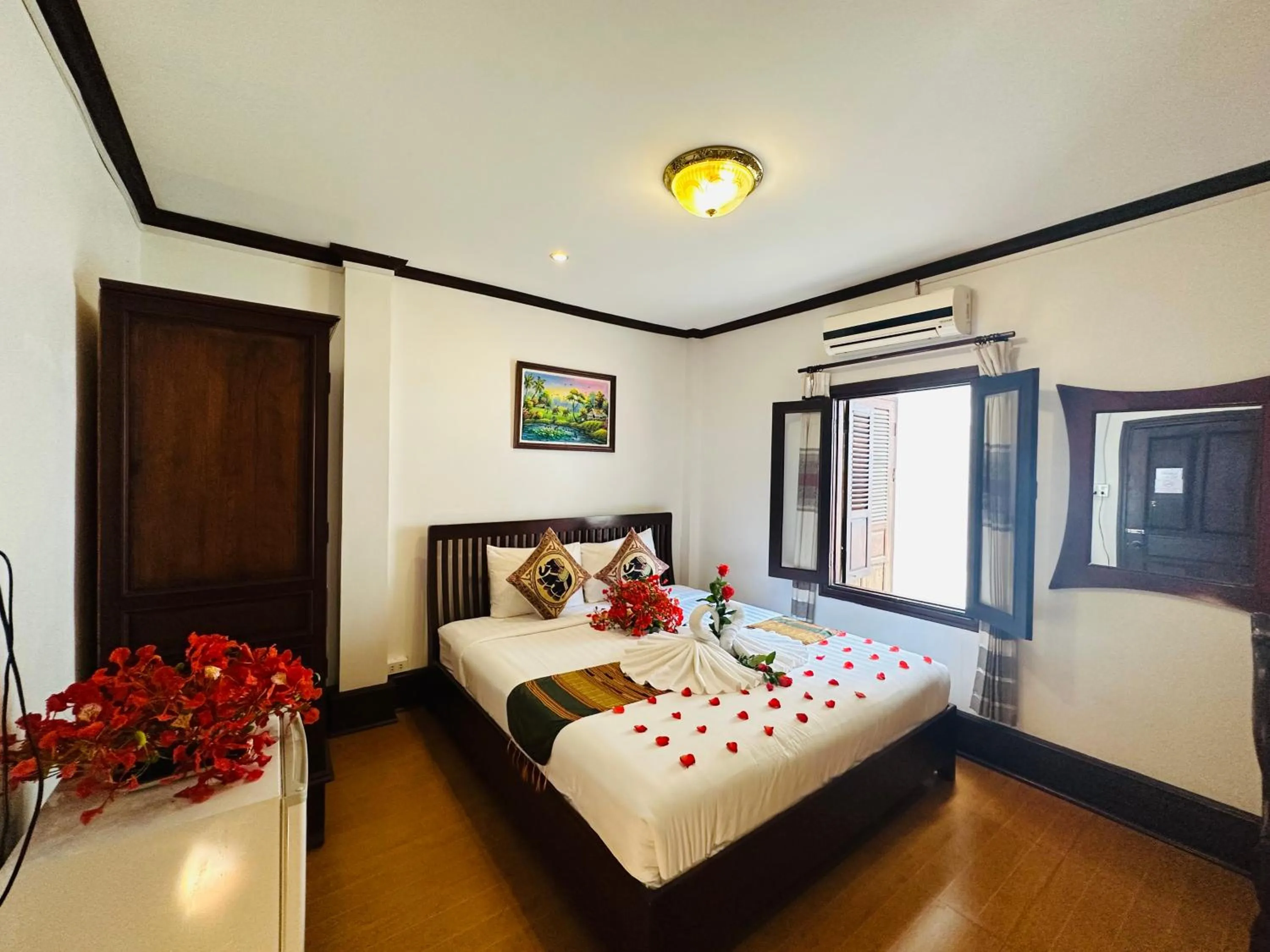 Bed in Thatsaphone Hotel