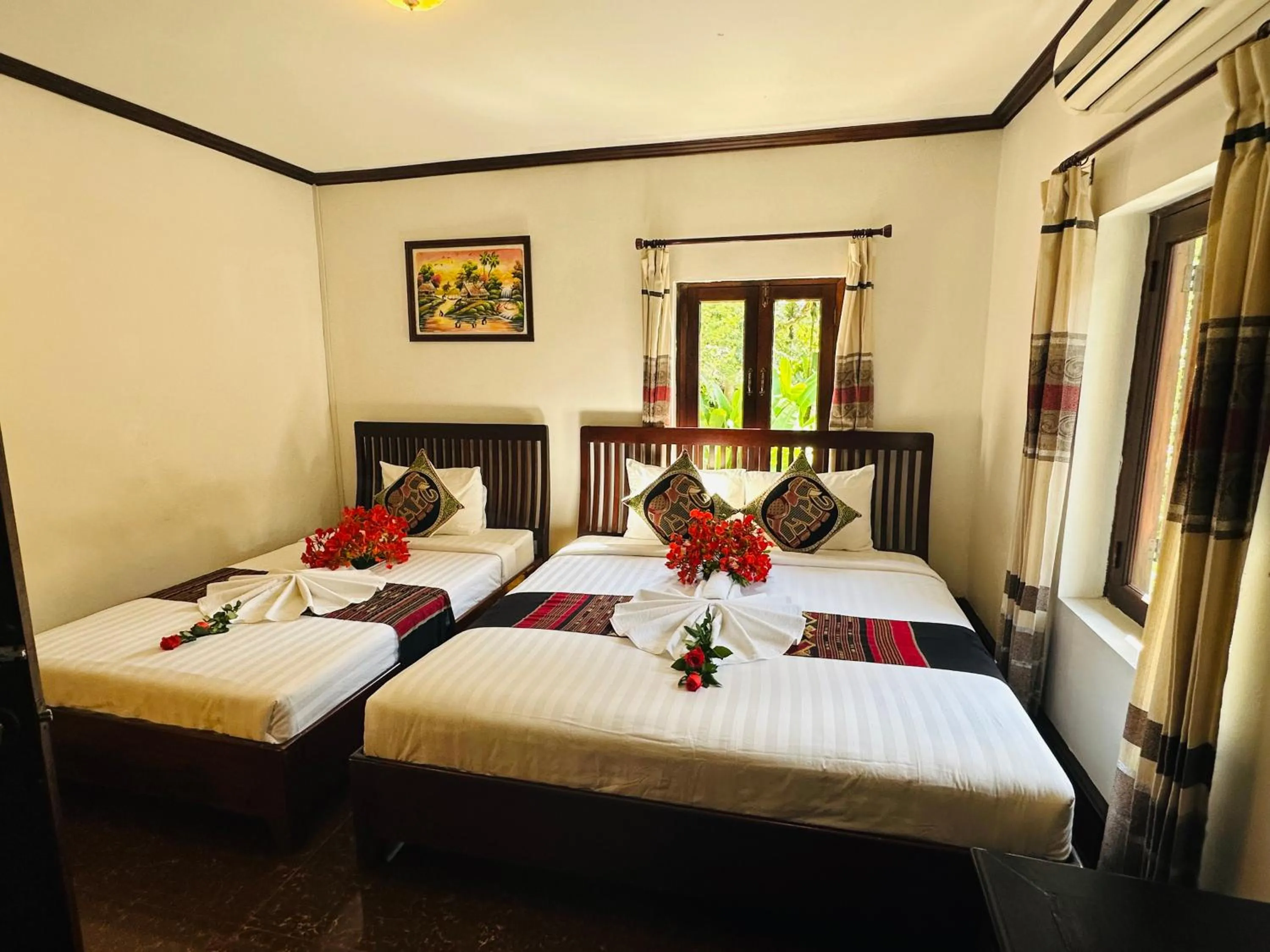 Bed in Thatsaphone Hotel