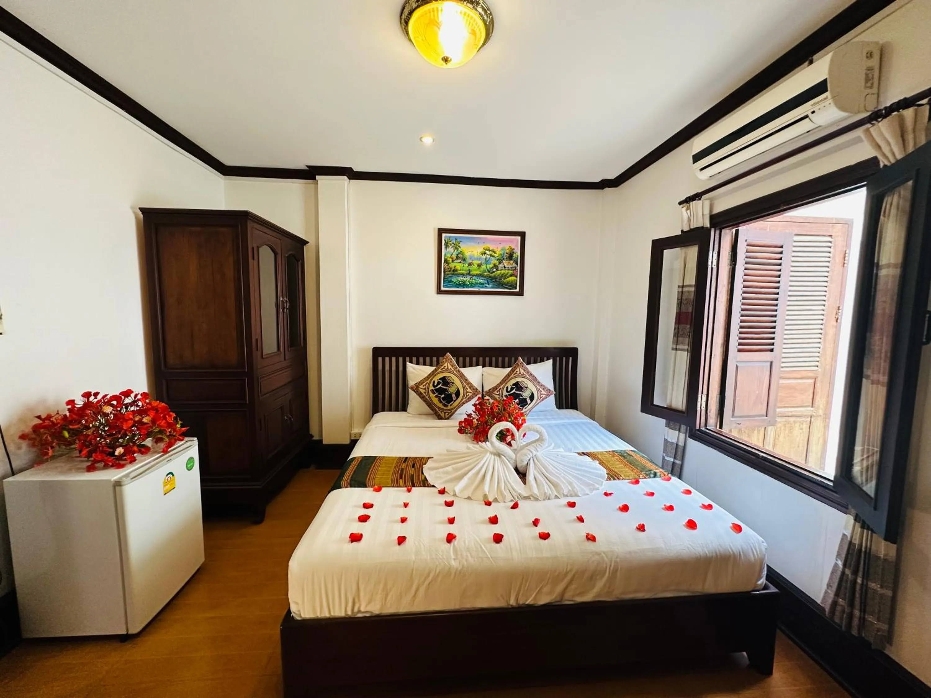 Bed in Thatsaphone Hotel