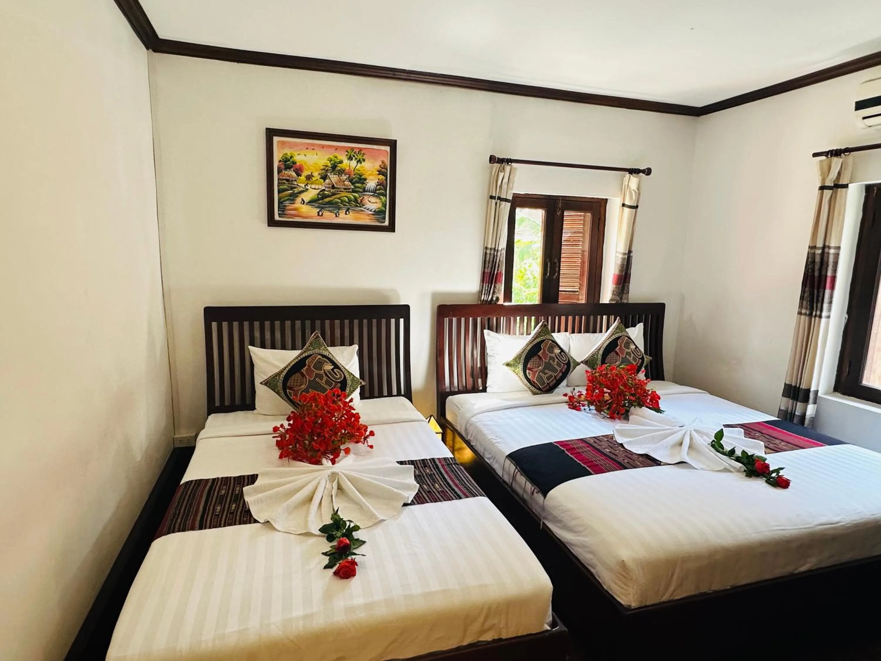 Bed in Thatsaphone Hotel