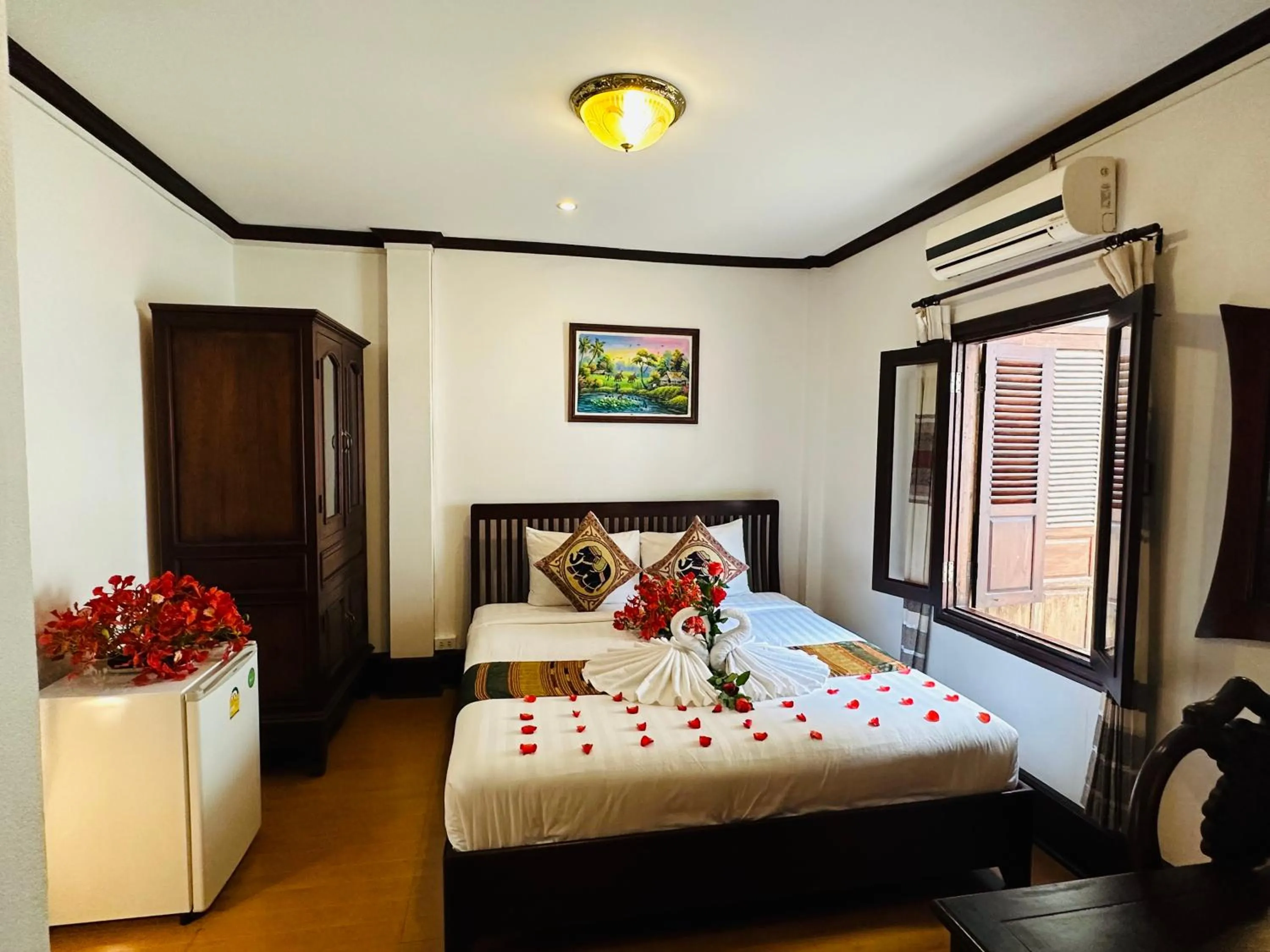 Bed in Thatsaphone Hotel