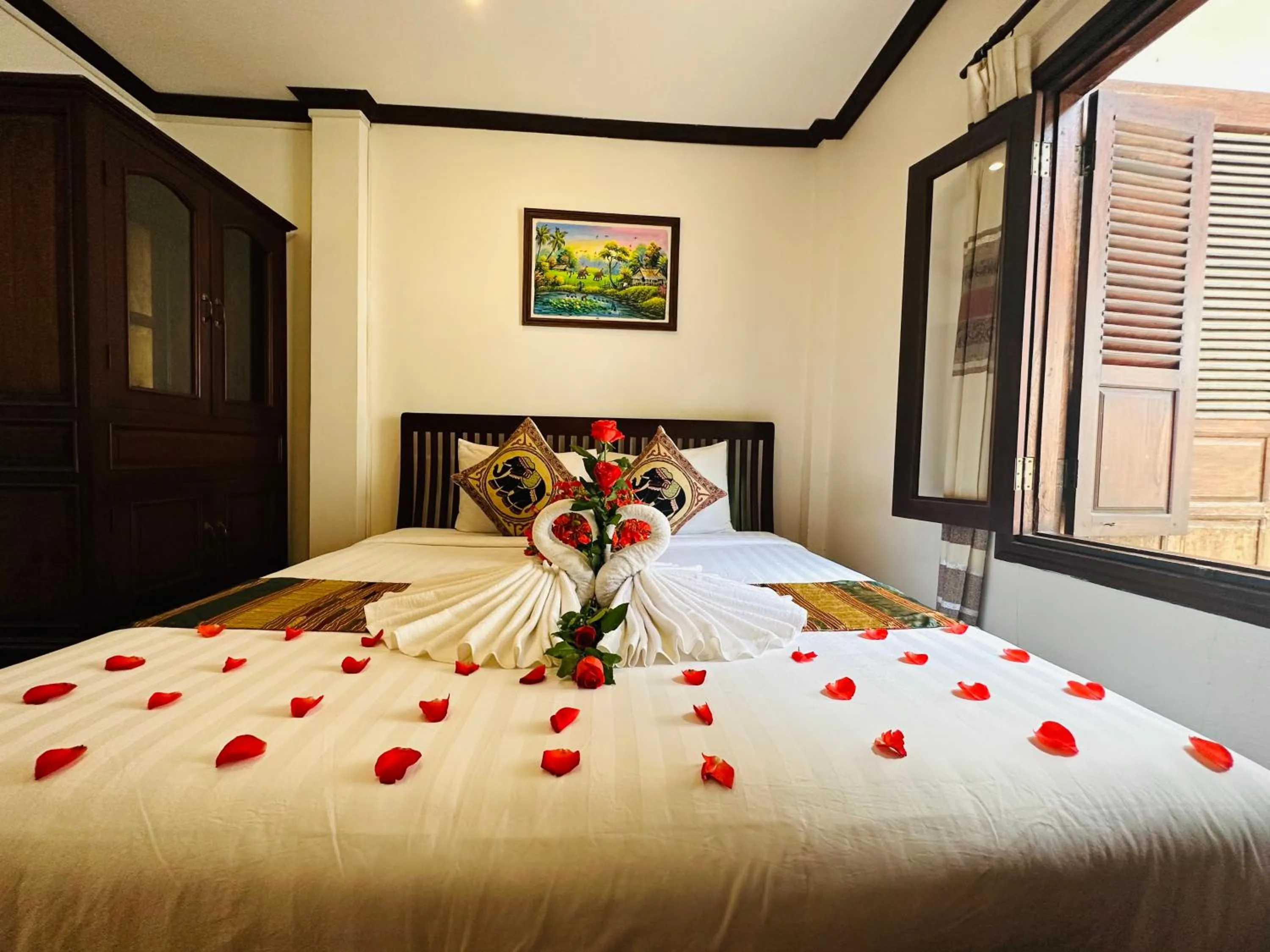 Bed in Thatsaphone Hotel