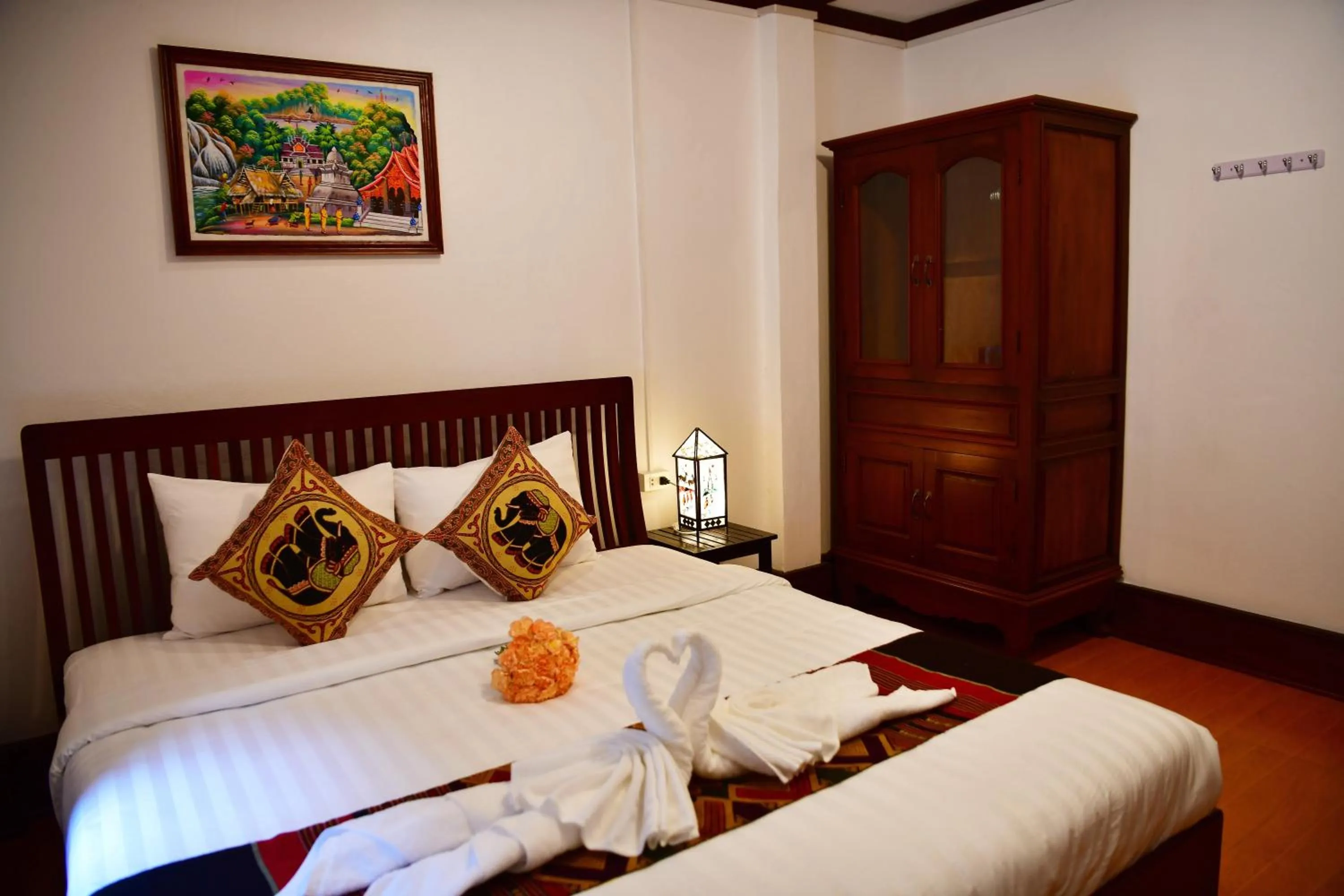 Bed in Thatsaphone Hotel