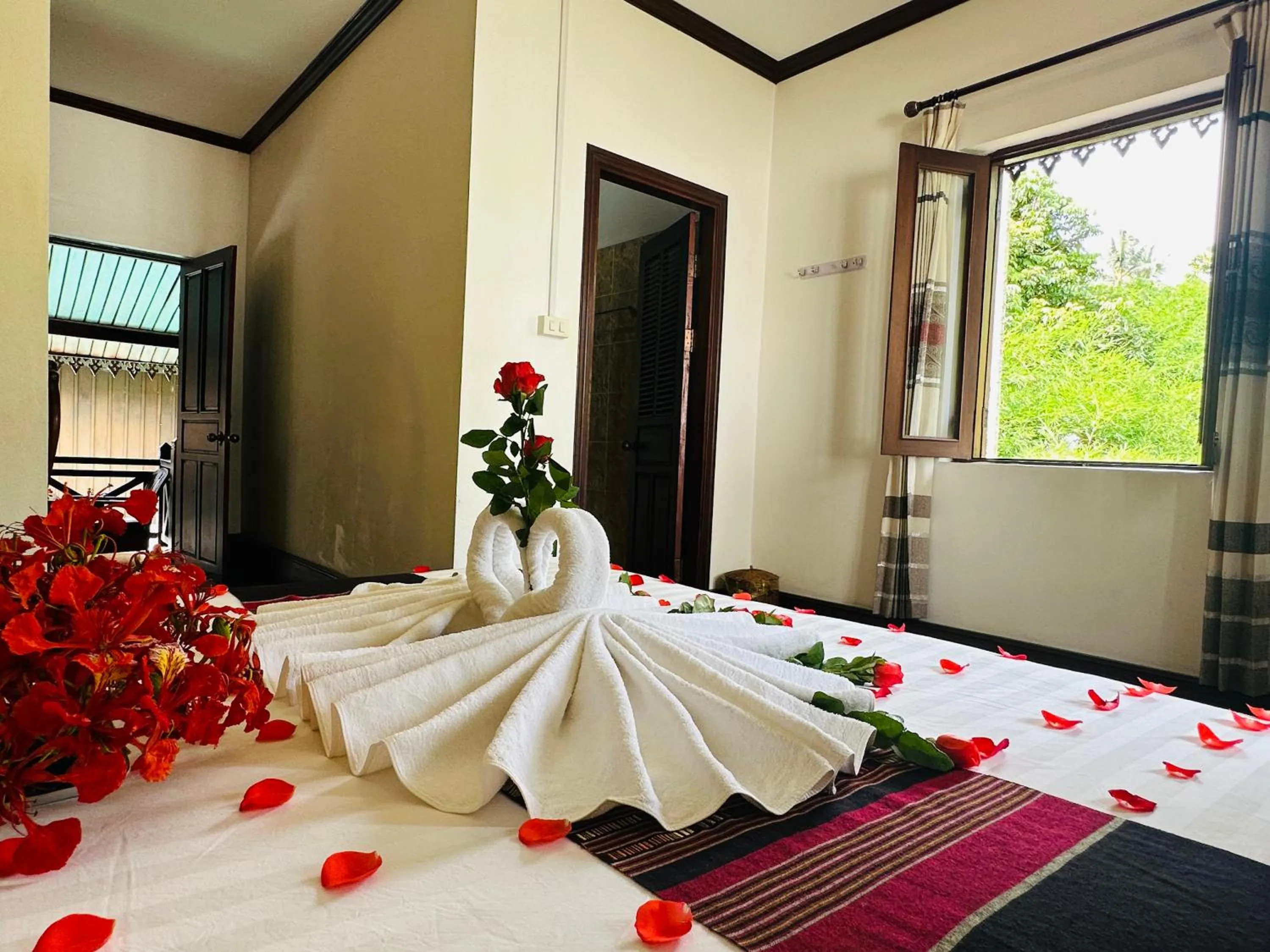 Bed in Thatsaphone Hotel