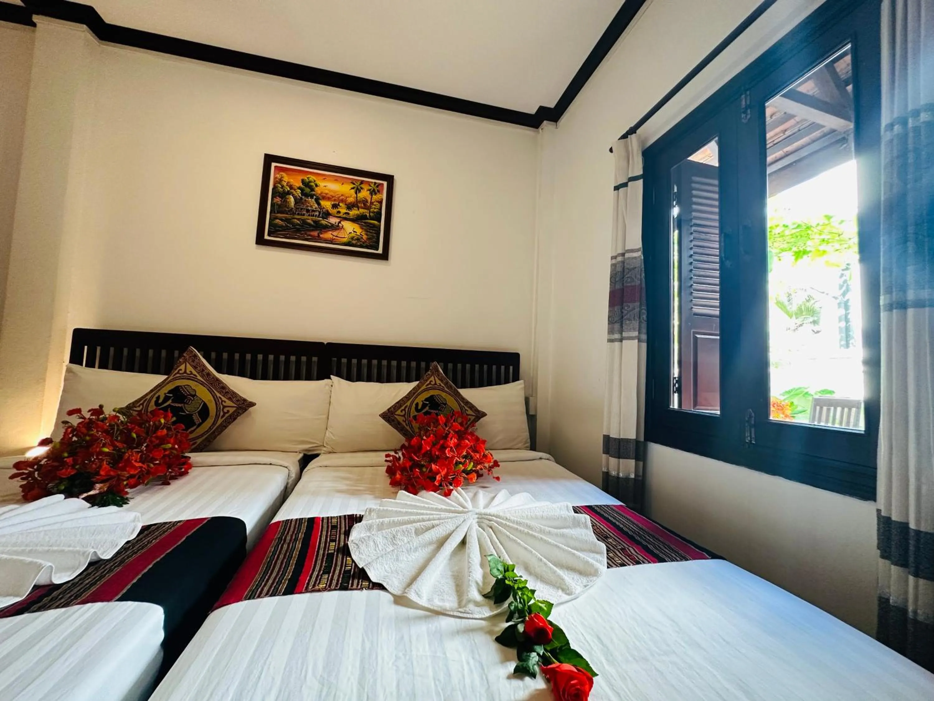 Bed in Thatsaphone Hotel