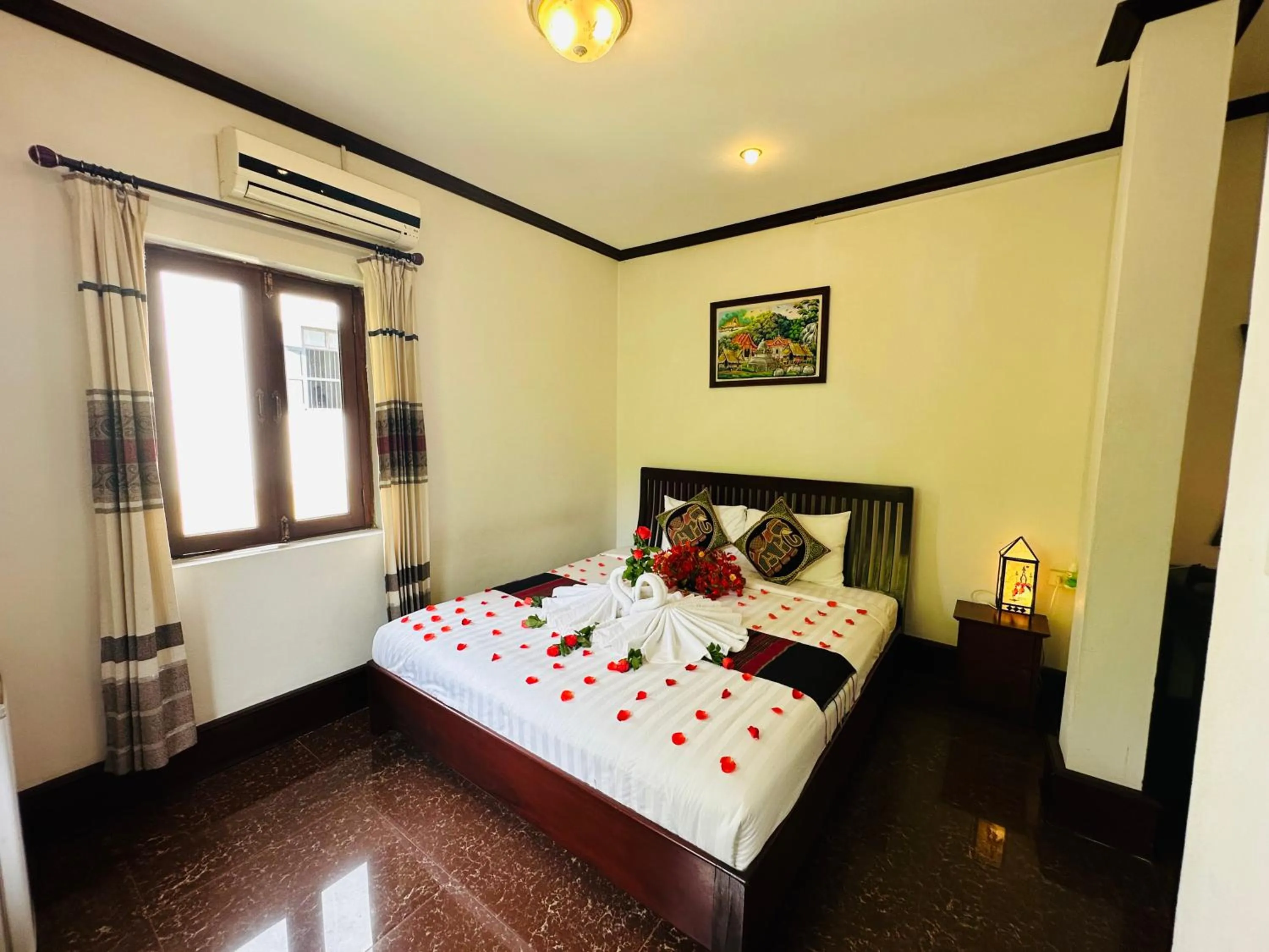 Bed in Thatsaphone Hotel