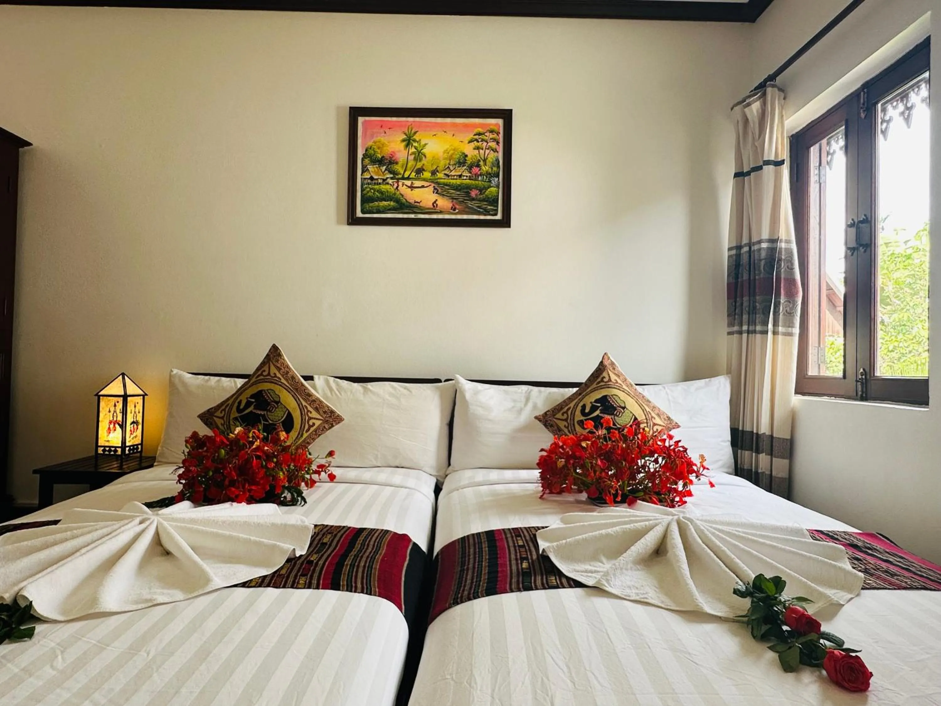 Bed in Thatsaphone Hotel