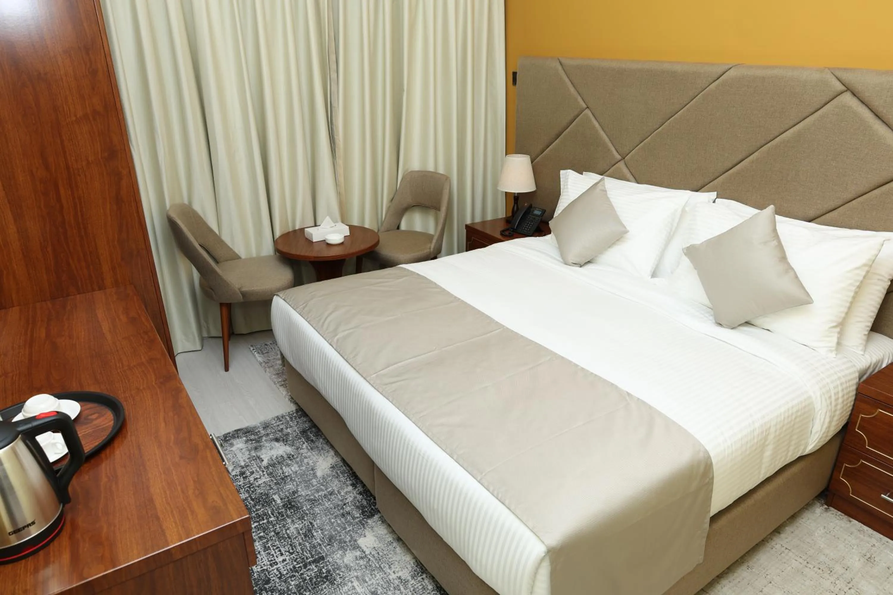 Bed in Grand Marino Hotel