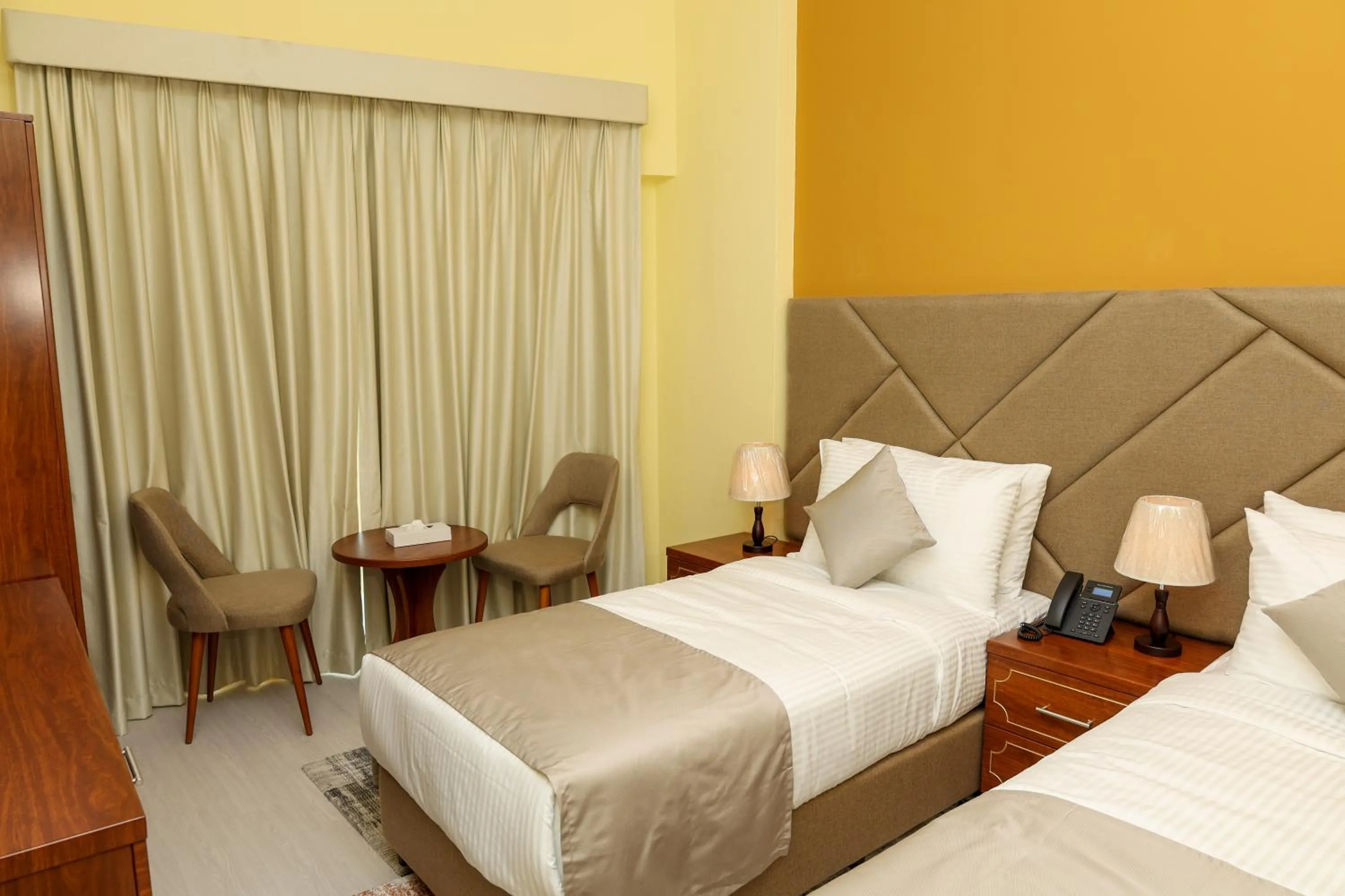 Bed in Grand Marino Hotel