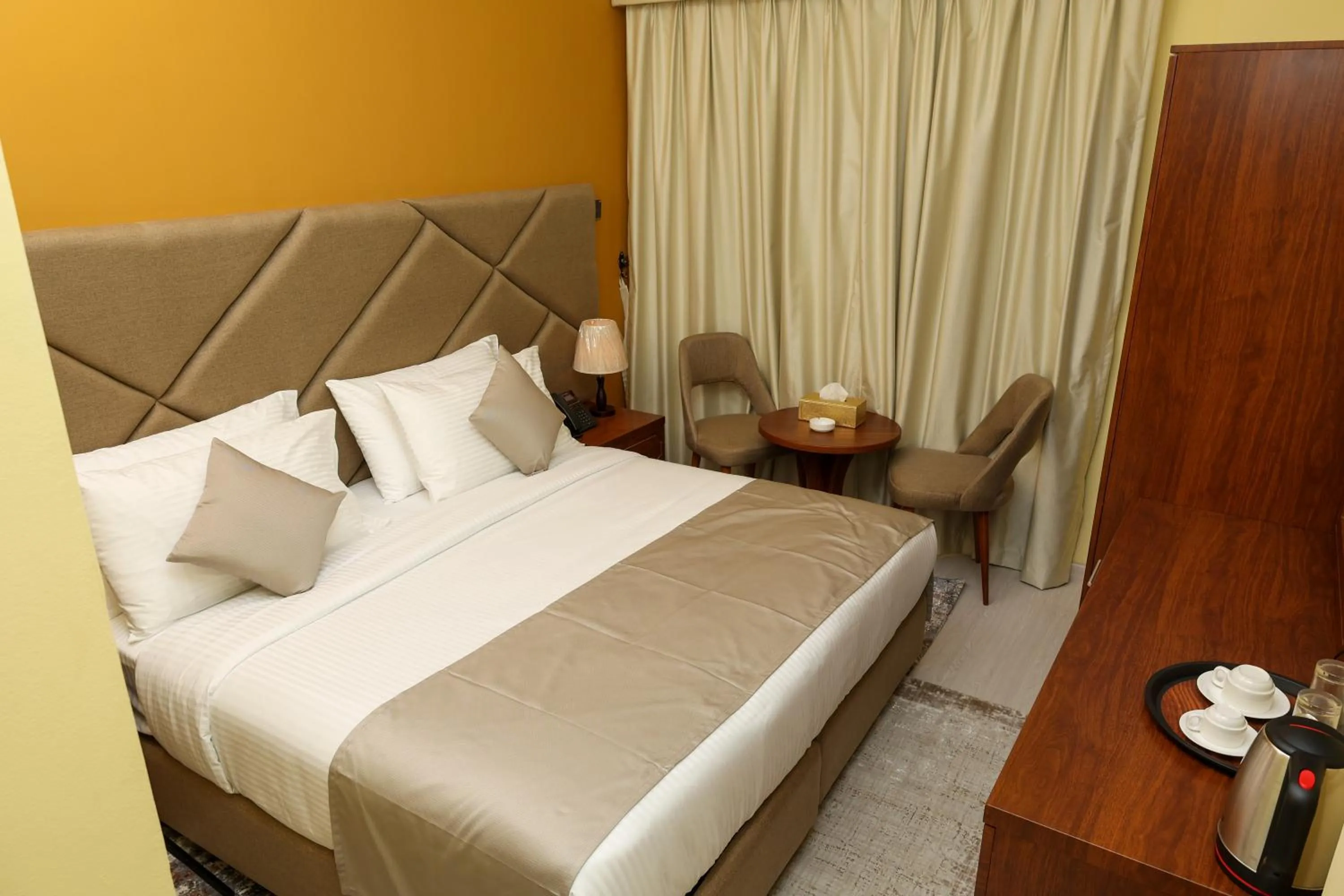 Bed in Grand Marino Hotel