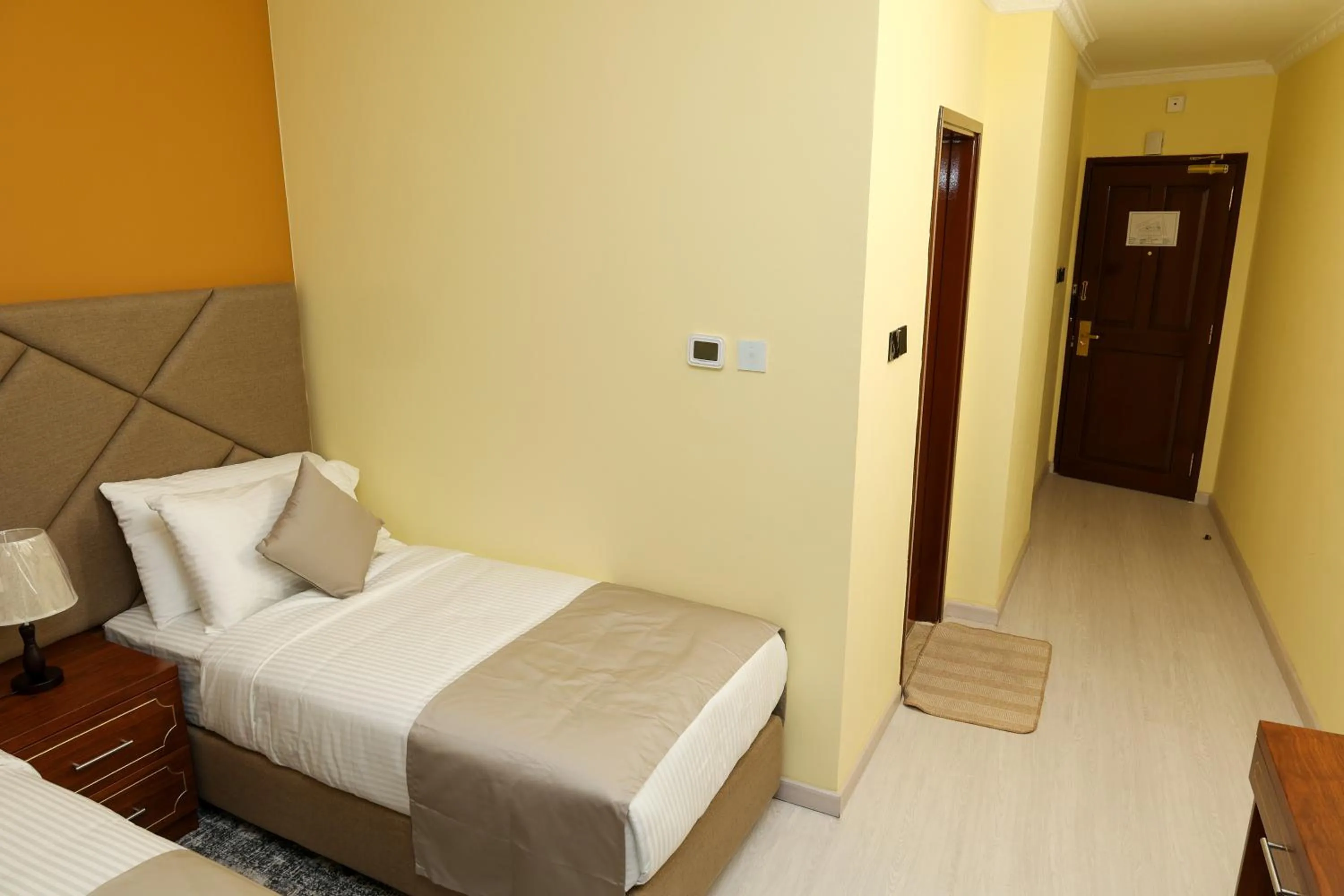 Bed in Grand Marino Hotel