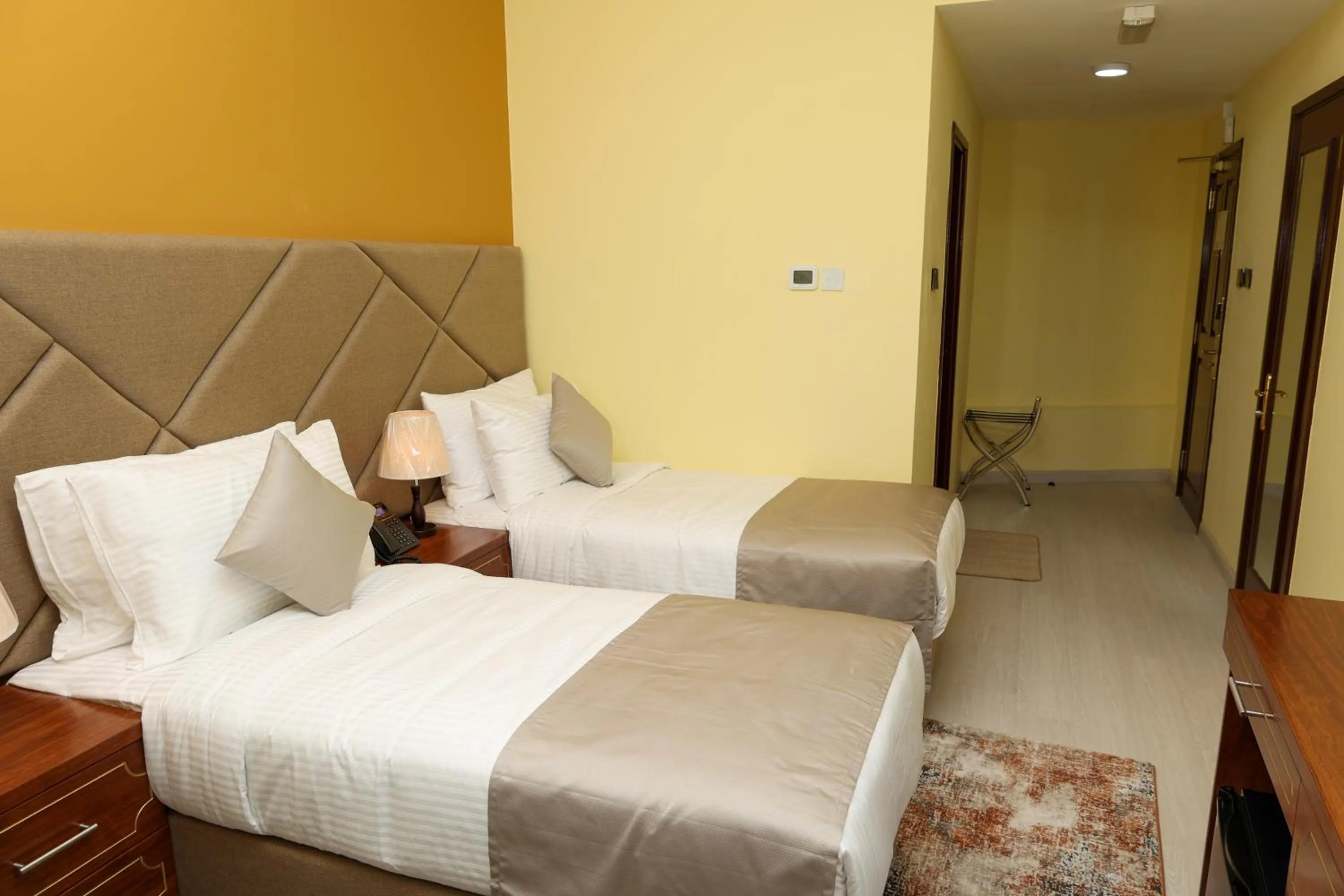 Bed in Grand Marino Hotel