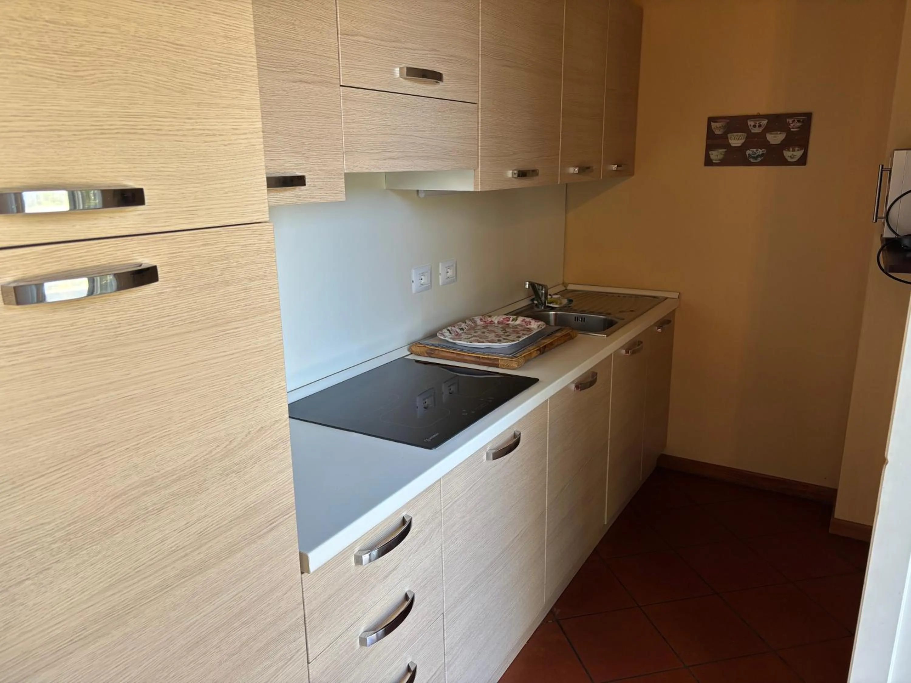 Kitchen or kitchenette in Apartments Relais Corte Paradiso
