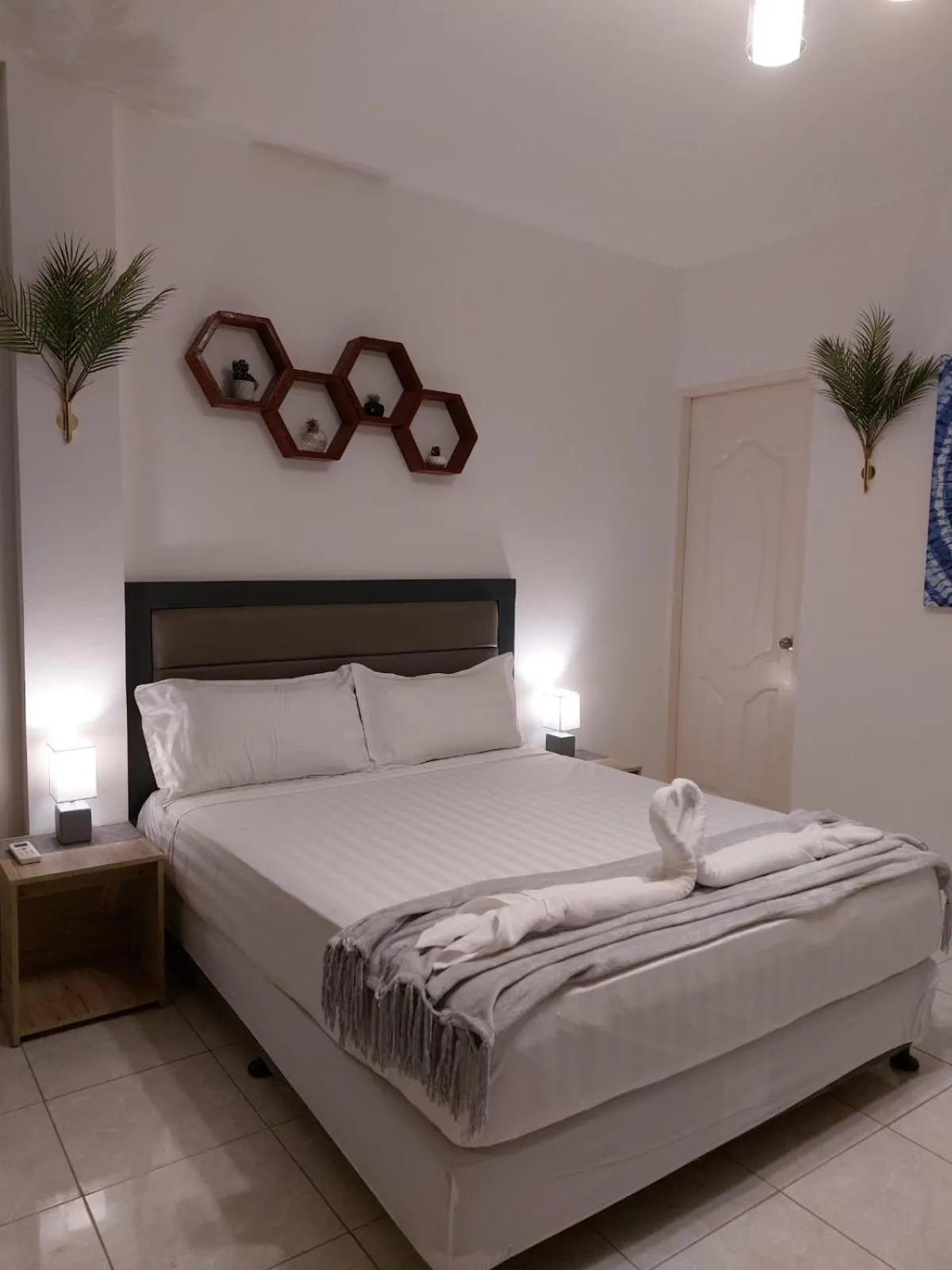 Bed in Bonsai Jacuzzi Suites