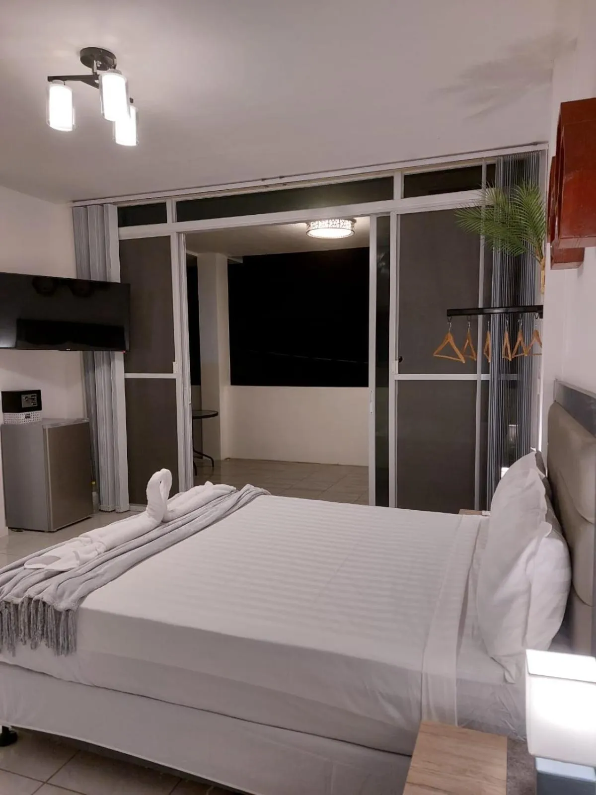 Bed in Bonsai Jacuzzi Suites