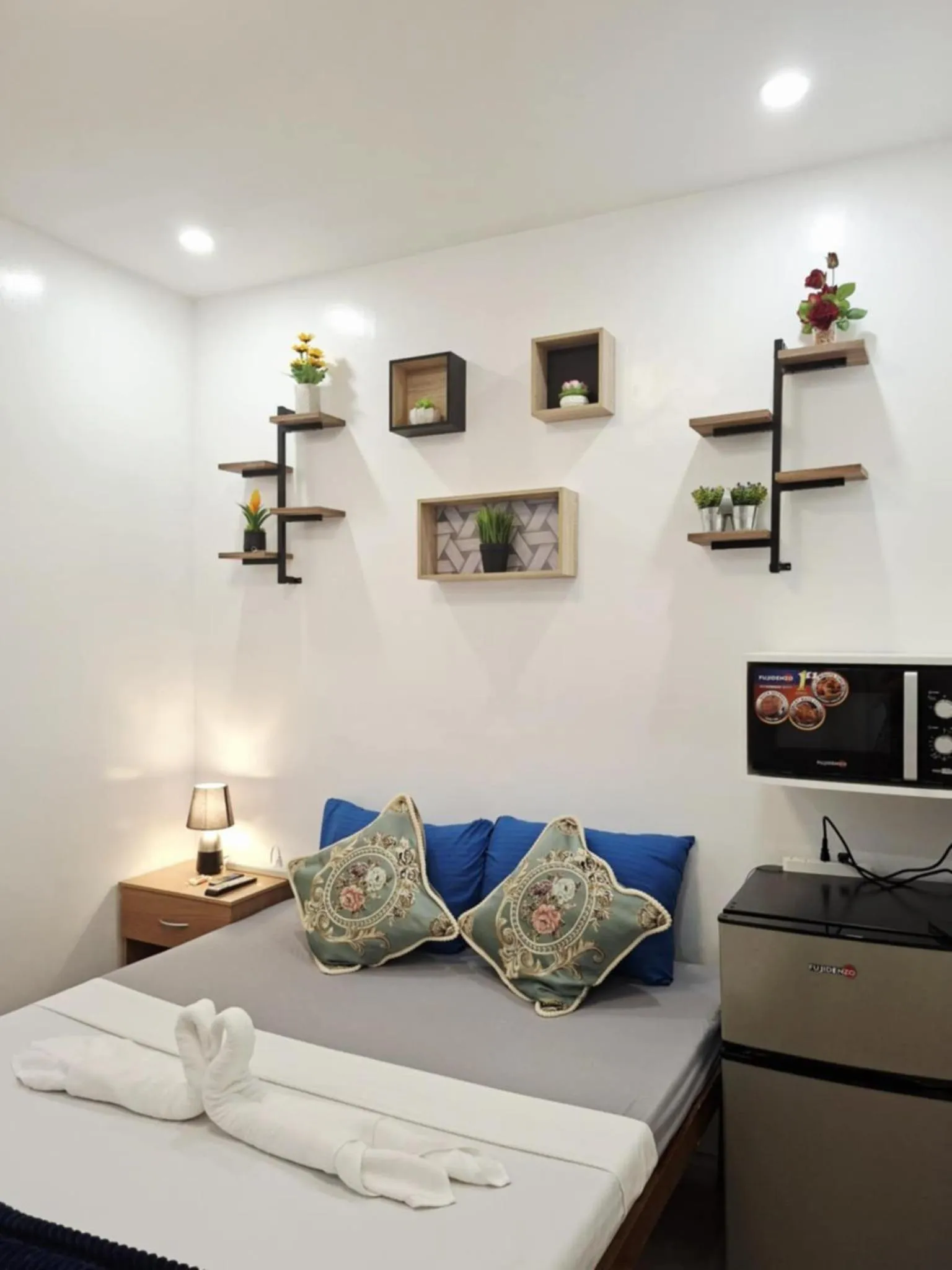 Bed in Bonsai Jacuzzi Suites