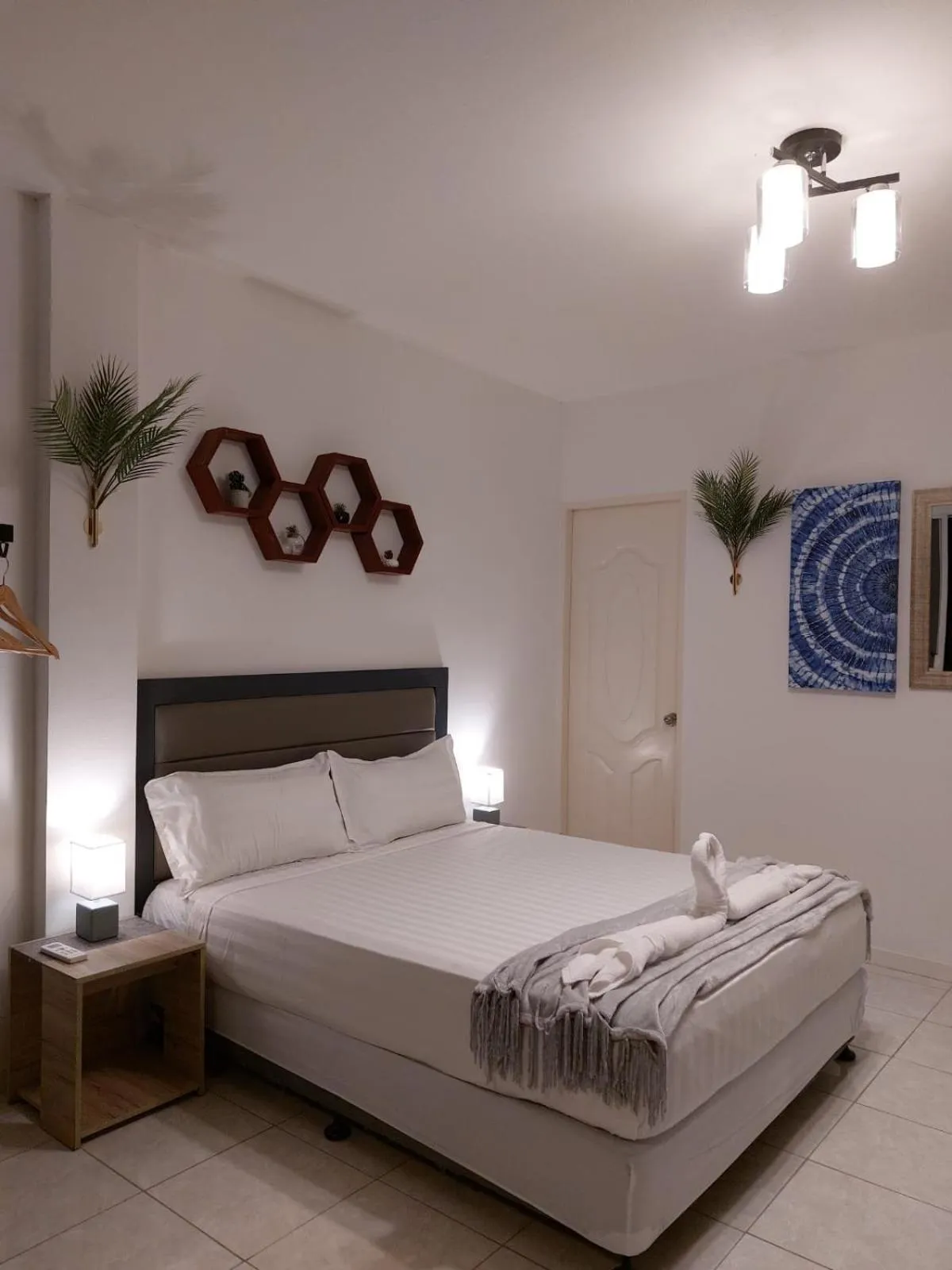 Bed in Bonsai Jacuzzi Suites