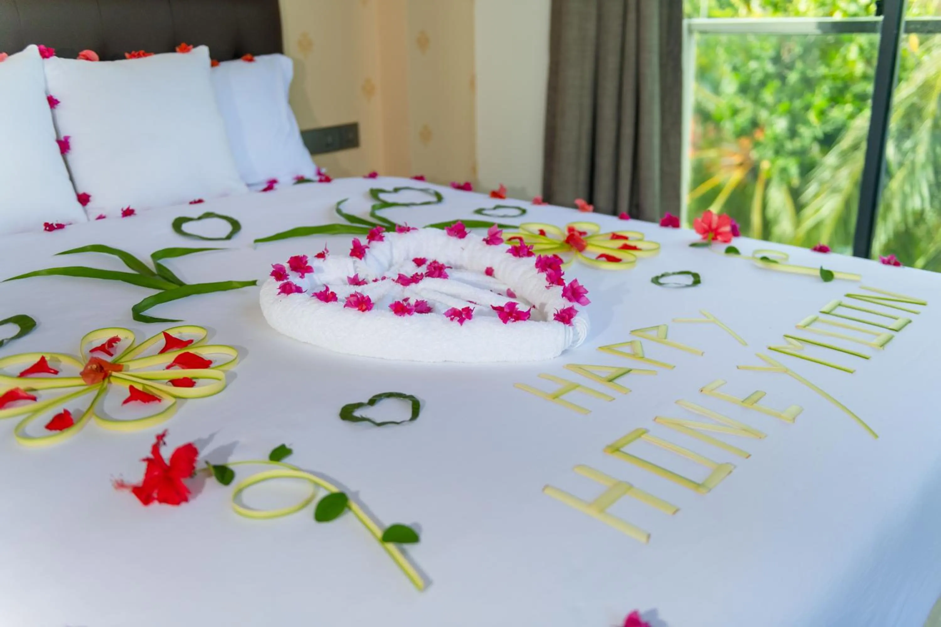 Bed in Ari Grand Hotel & Spa