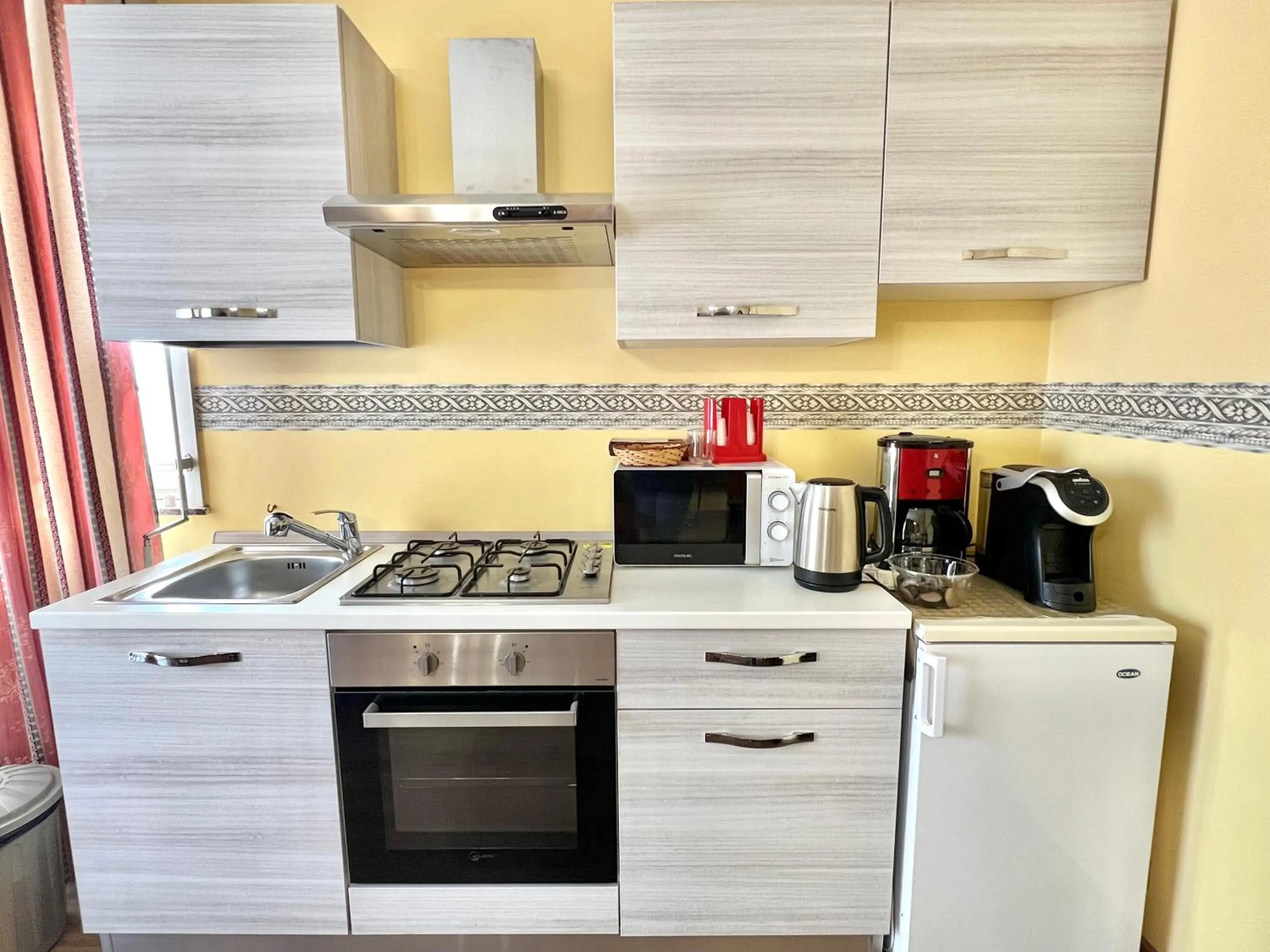 Kitchen or kitchenette in Ai Tre Parchi Bed And Bike