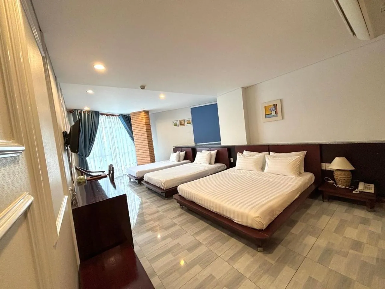 Living room, Bed in Kim Tho Hotel