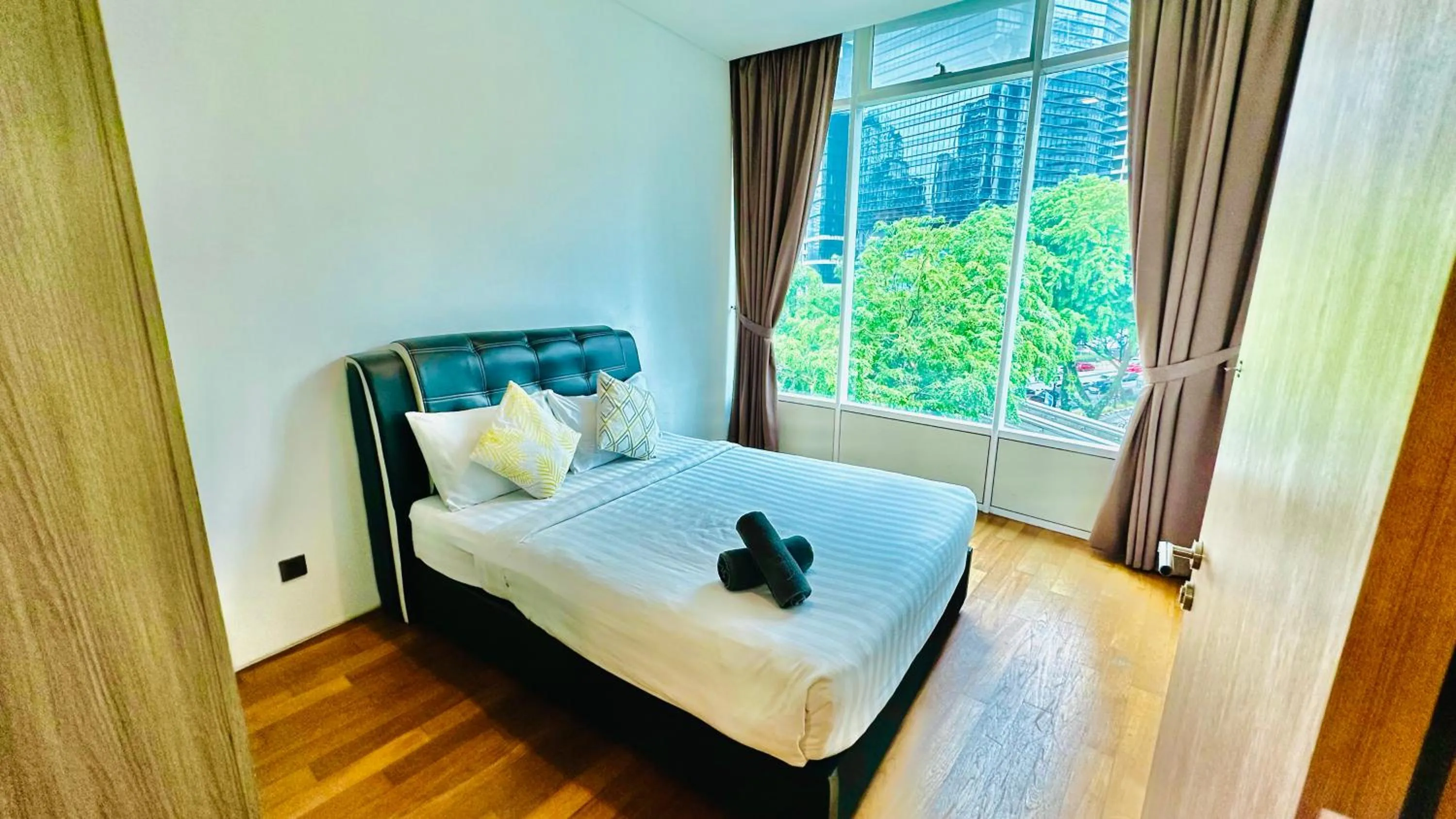 Bed in Vortex KLCC suites by Cityboxz