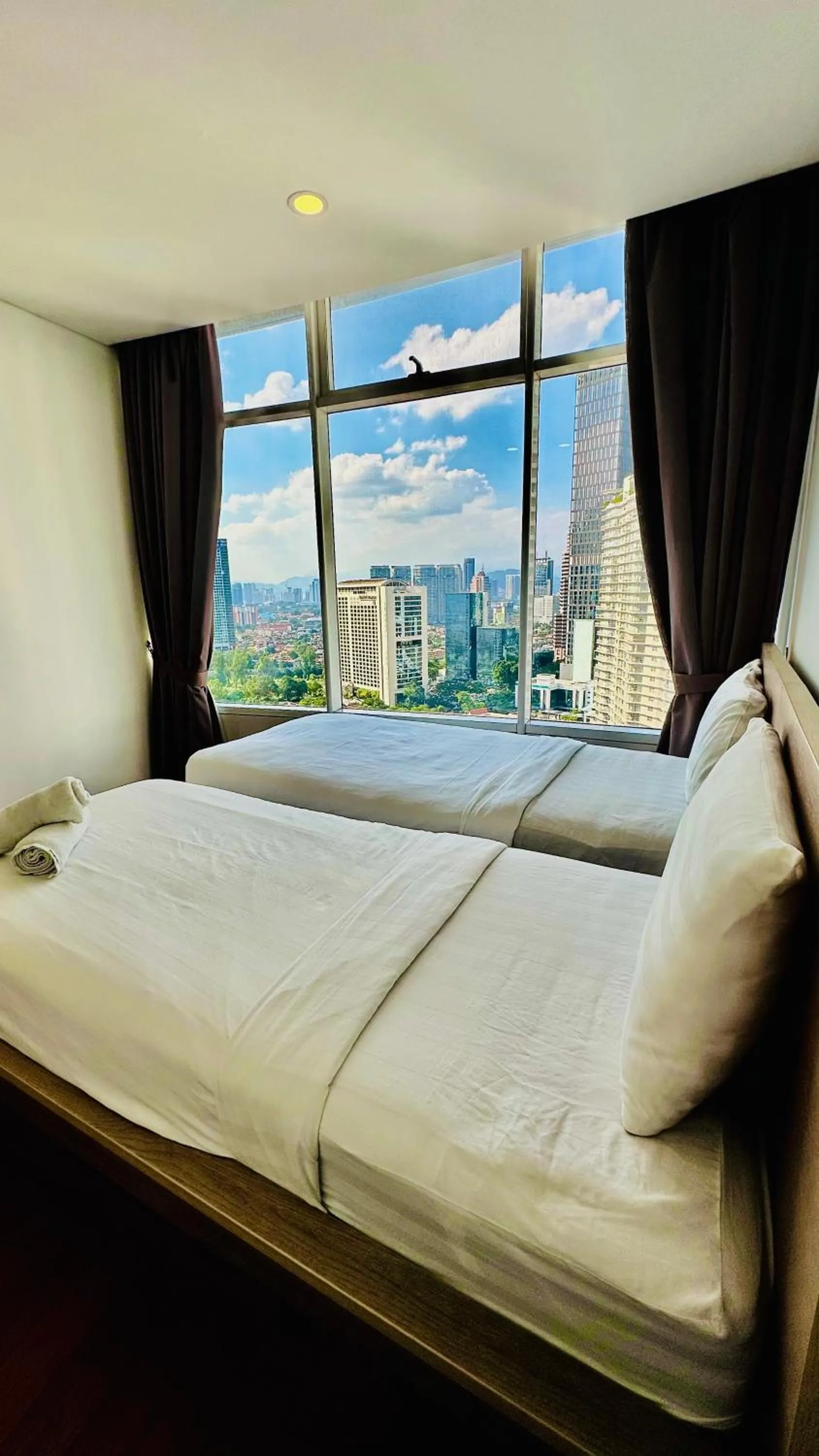 Bed in Vortex KLCC suites by Cityboxz