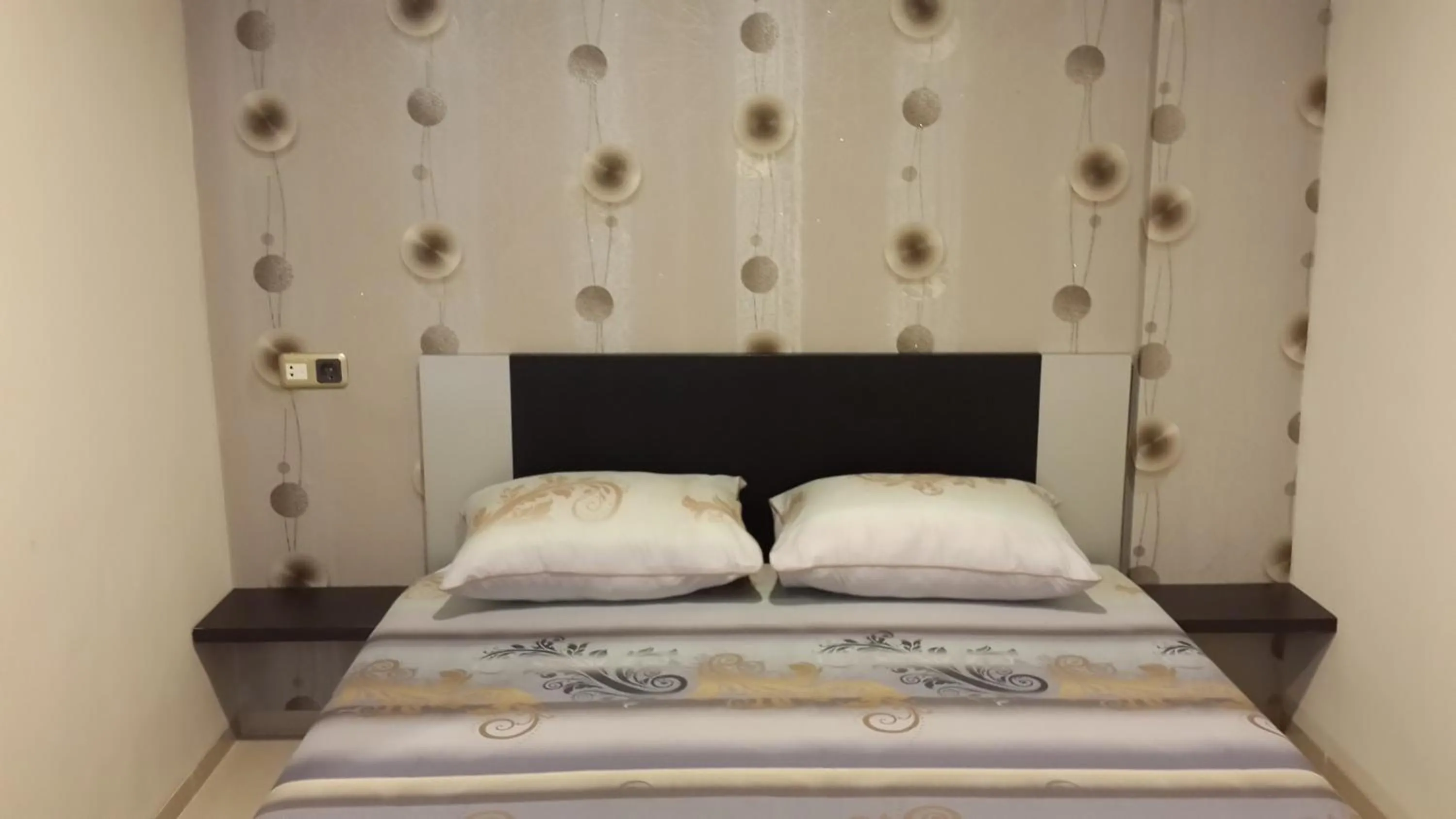 Bed in iHome Residence