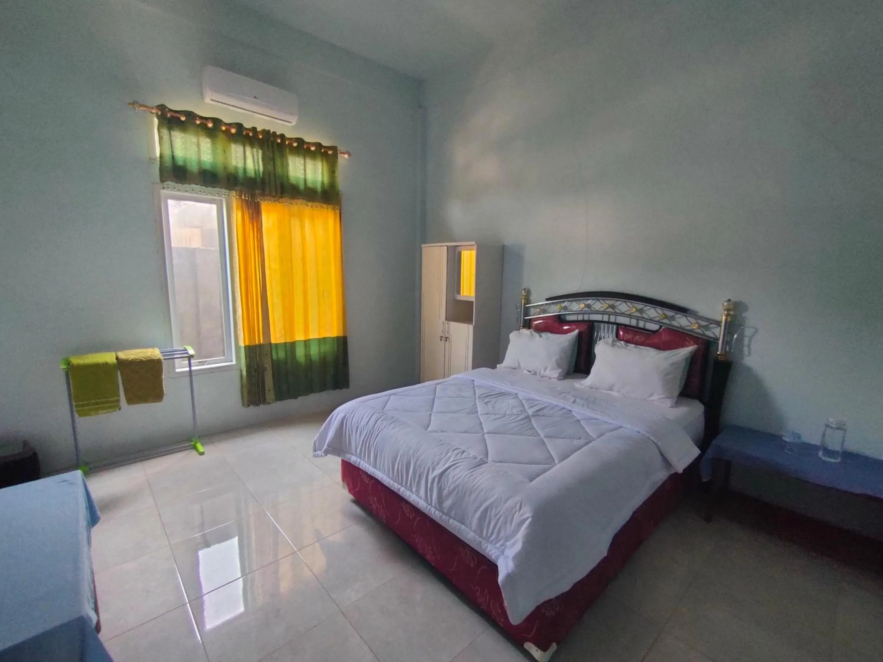 Bed in Tangkoko Guest House